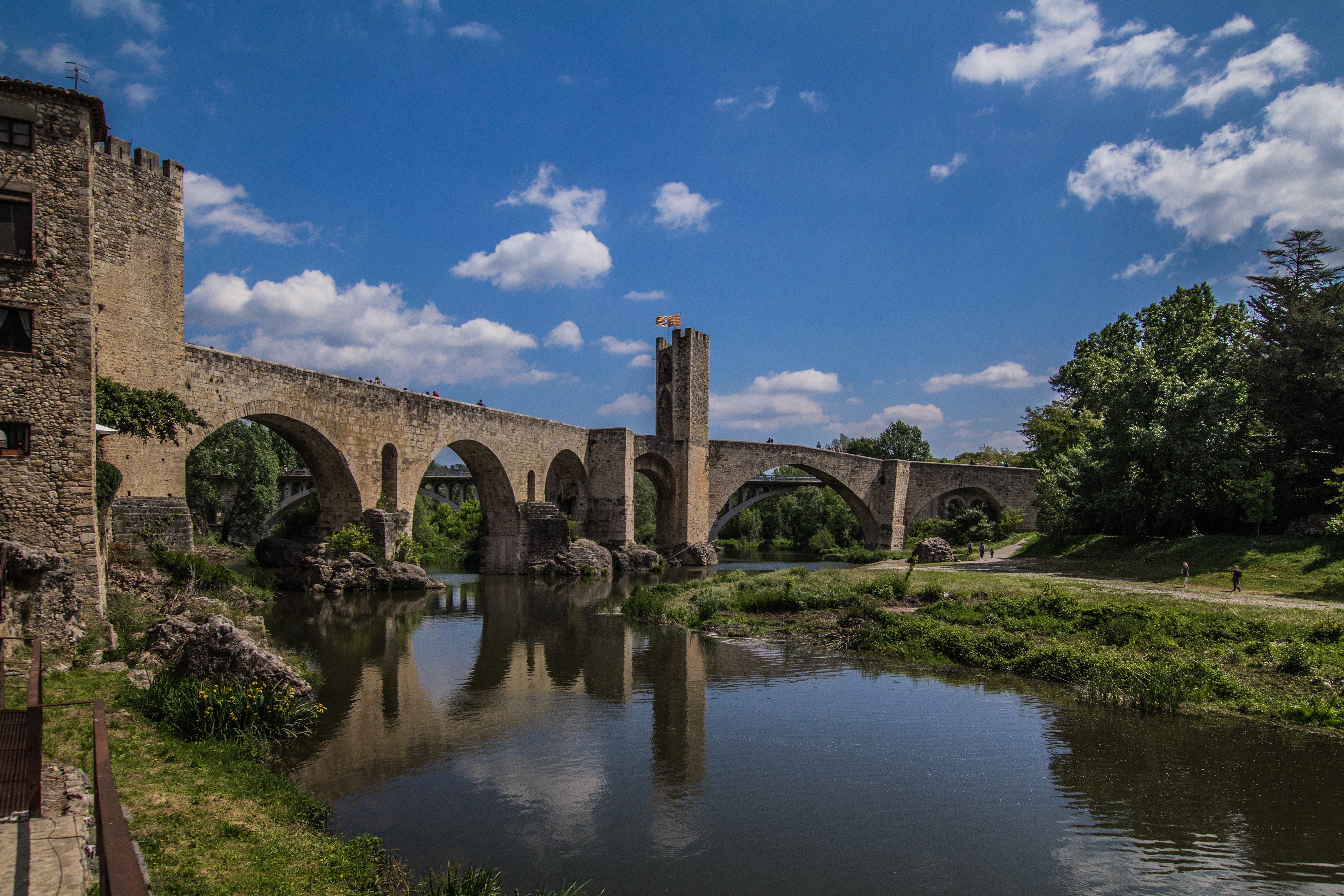 Stone bridge with tower over river in Catalonia, Spain HD Wallpaper