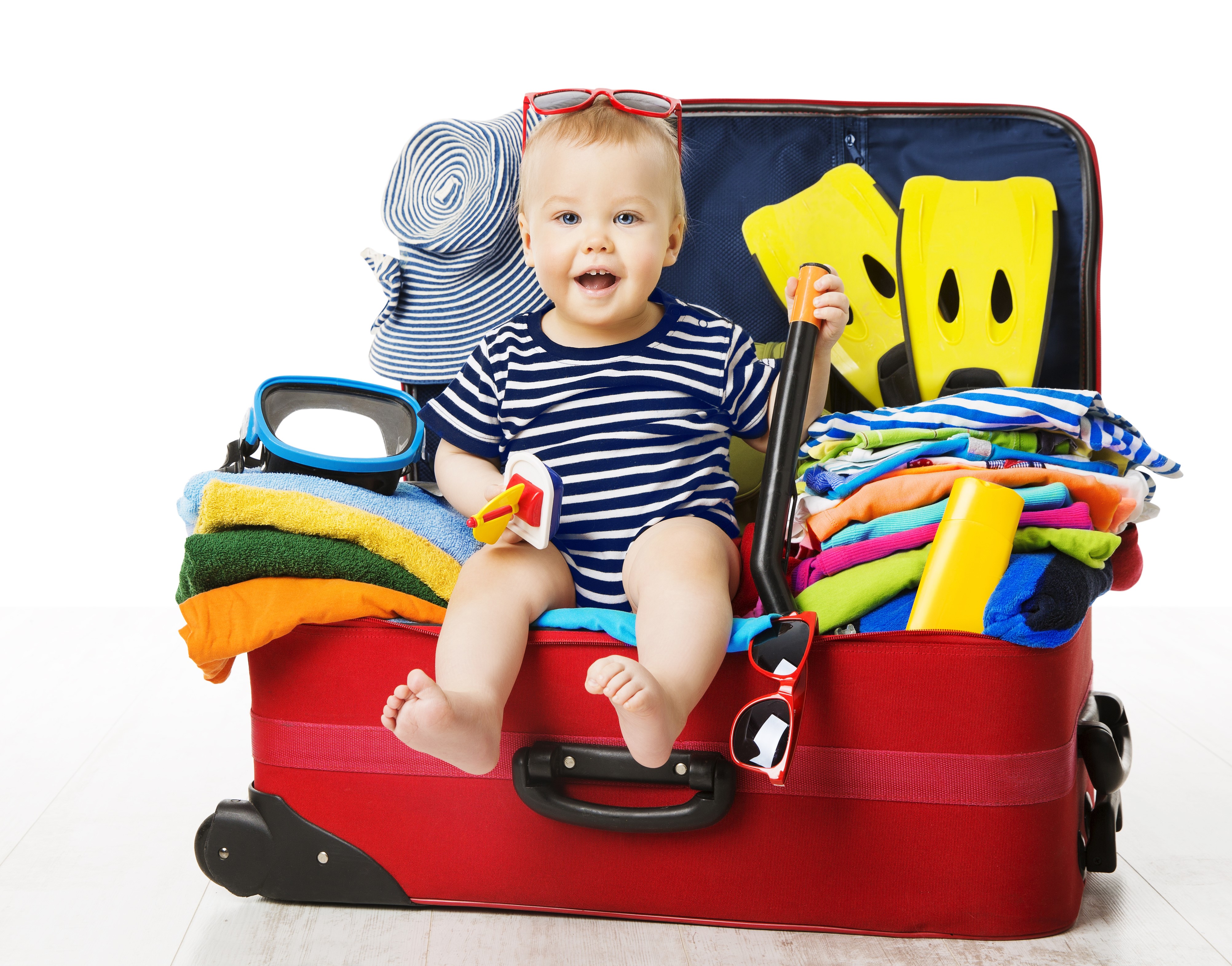 Baby sitting in a red suitcase packed for vacation HD Wallpaper