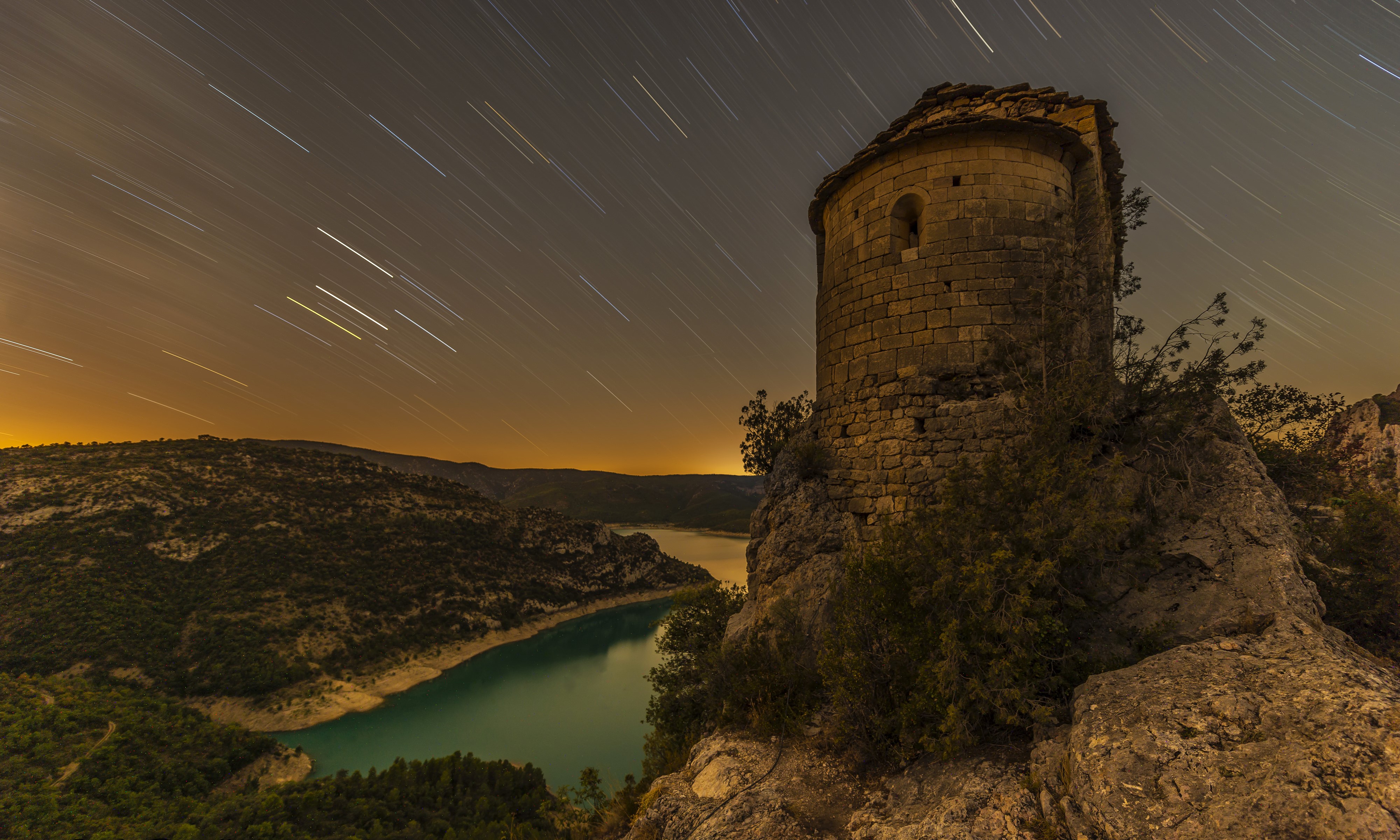 4K La Pertusa Spain Night Star Trails Over River and Hill HD Wallpaper