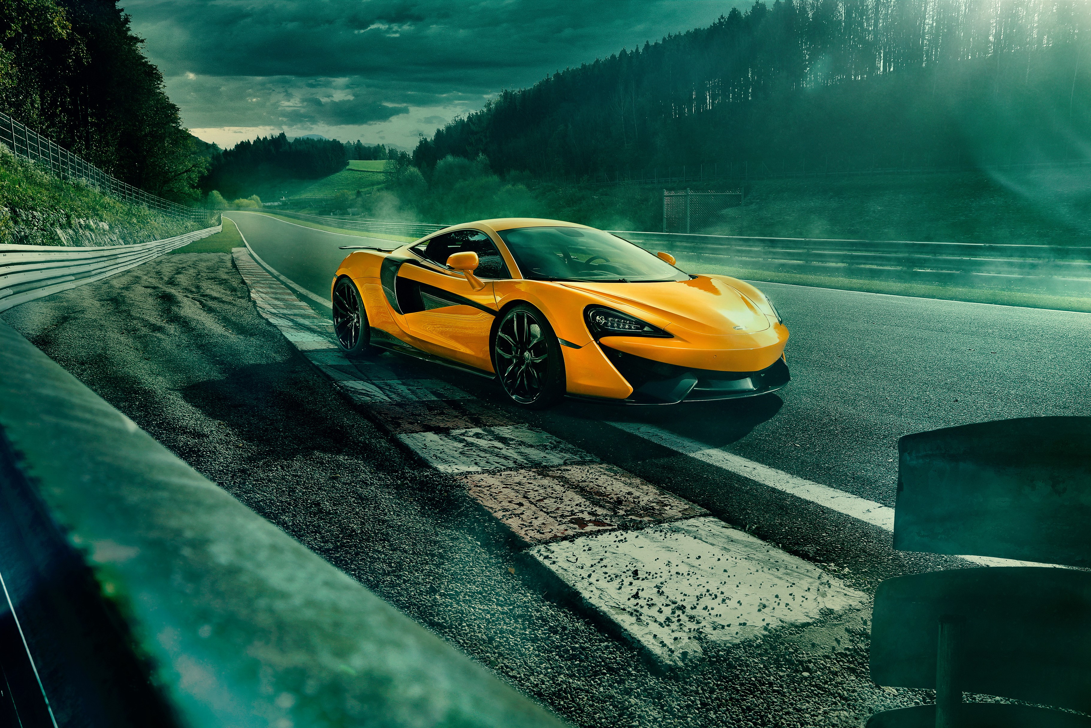 Yellow McLaren 570S on a Race Track HD Wallpaper