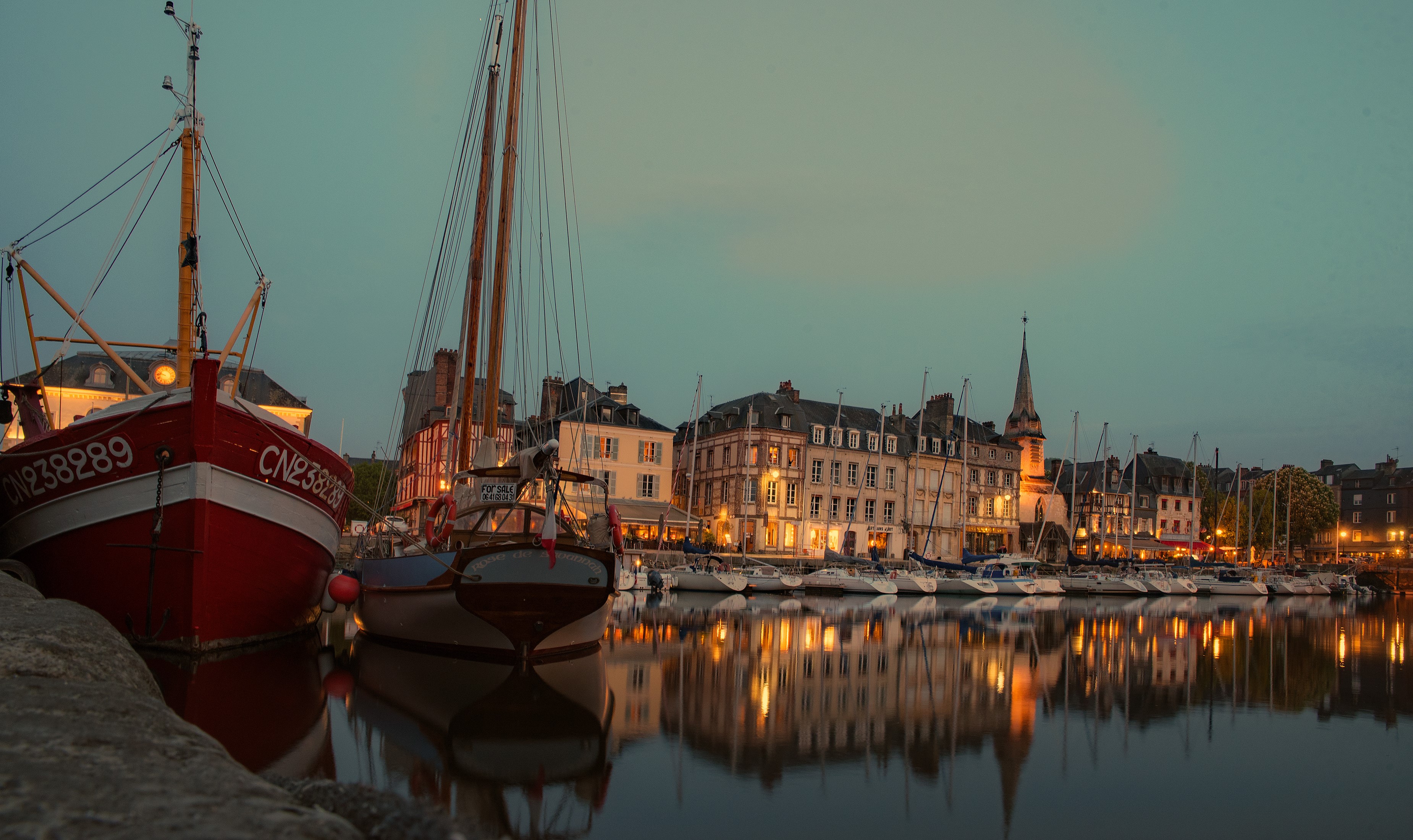 Honfleur harbor with boats and buildings at dusk HD Wallpaper