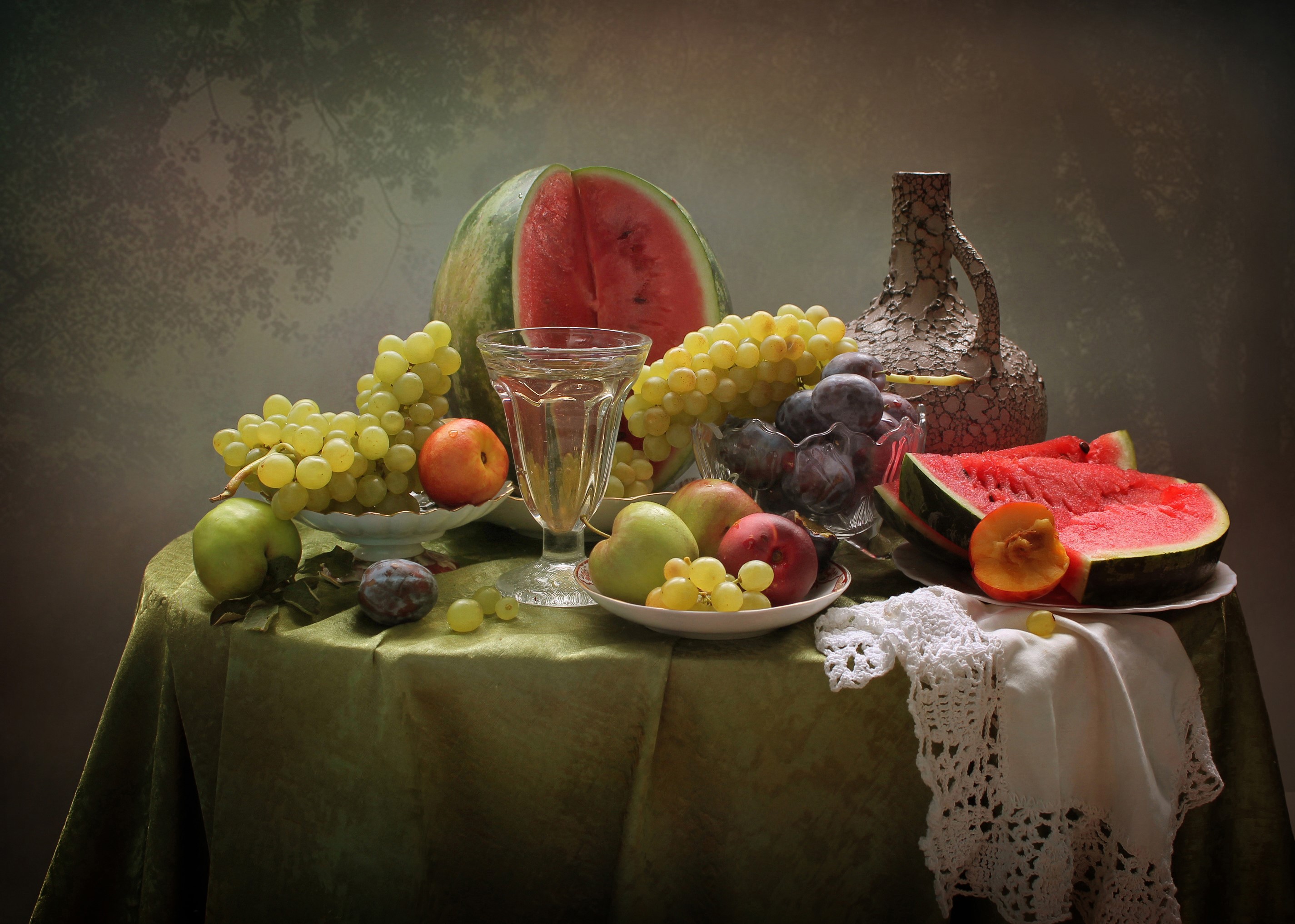 Still-life with watermelon, grapes, plums, apples, and a jug HD Wallpaper
