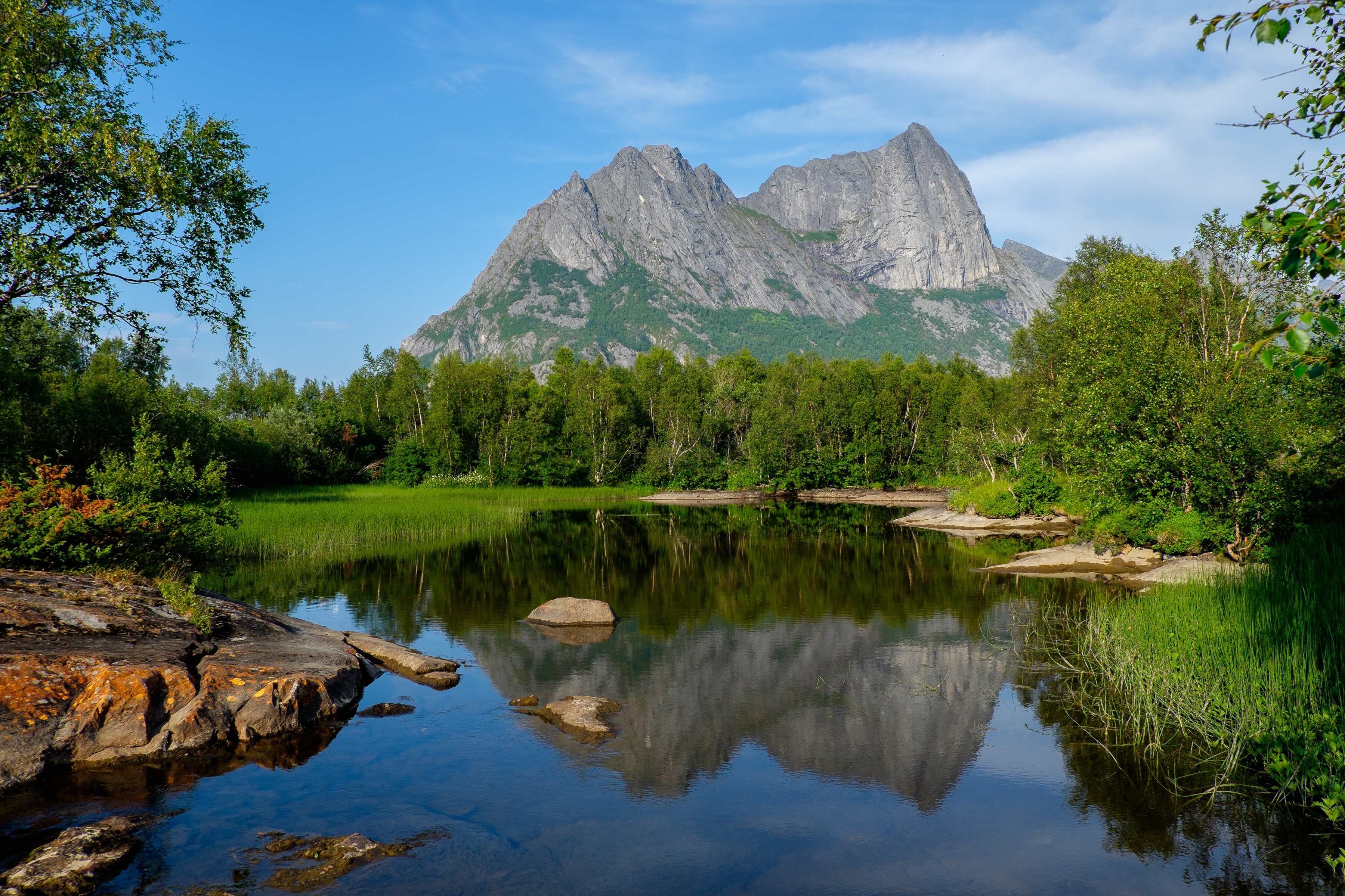Strandatinden mountain reflected in a lake in Norway HD Wallpaper