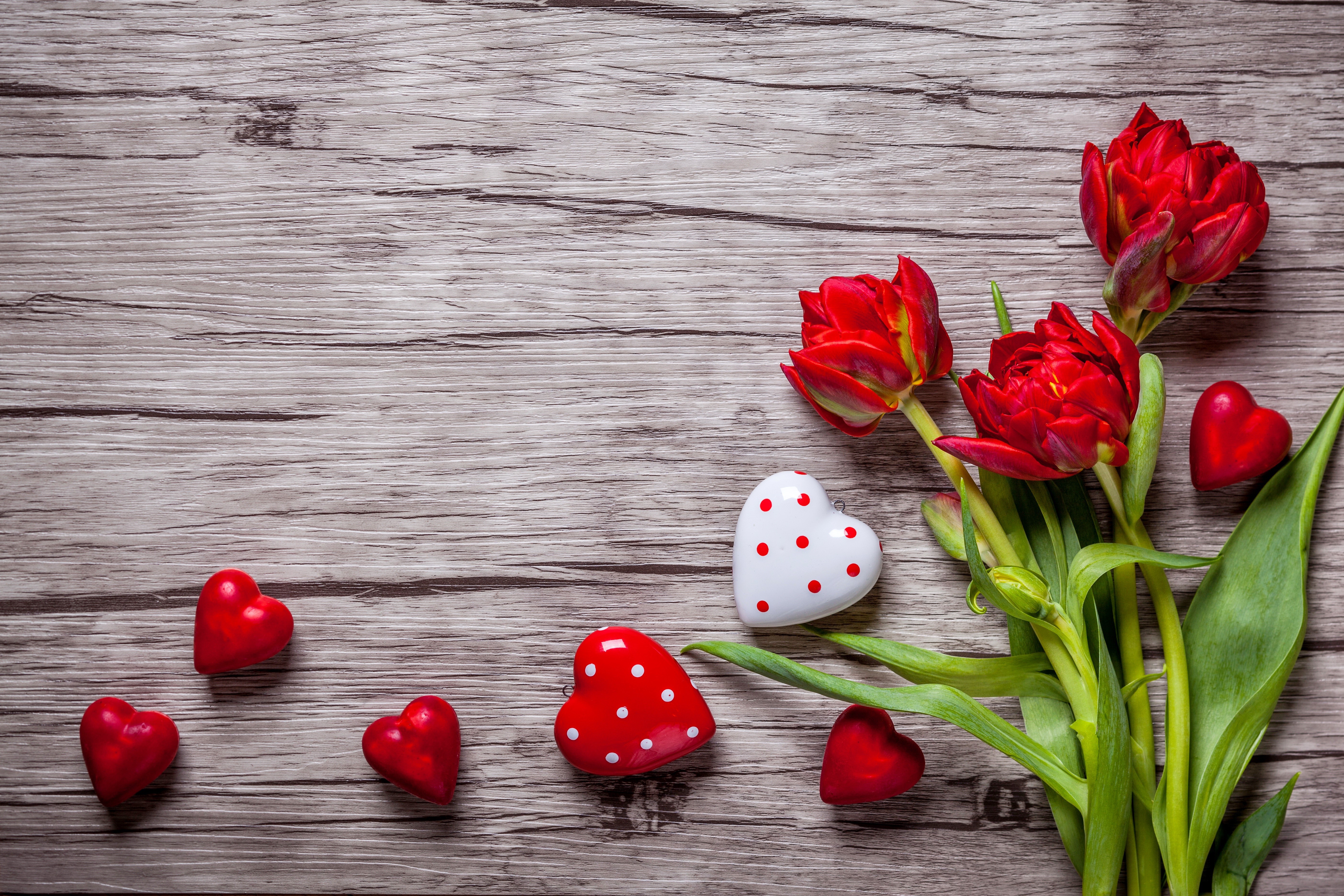Red Tulips and Hearts on Wooden Background HD Wallpaper