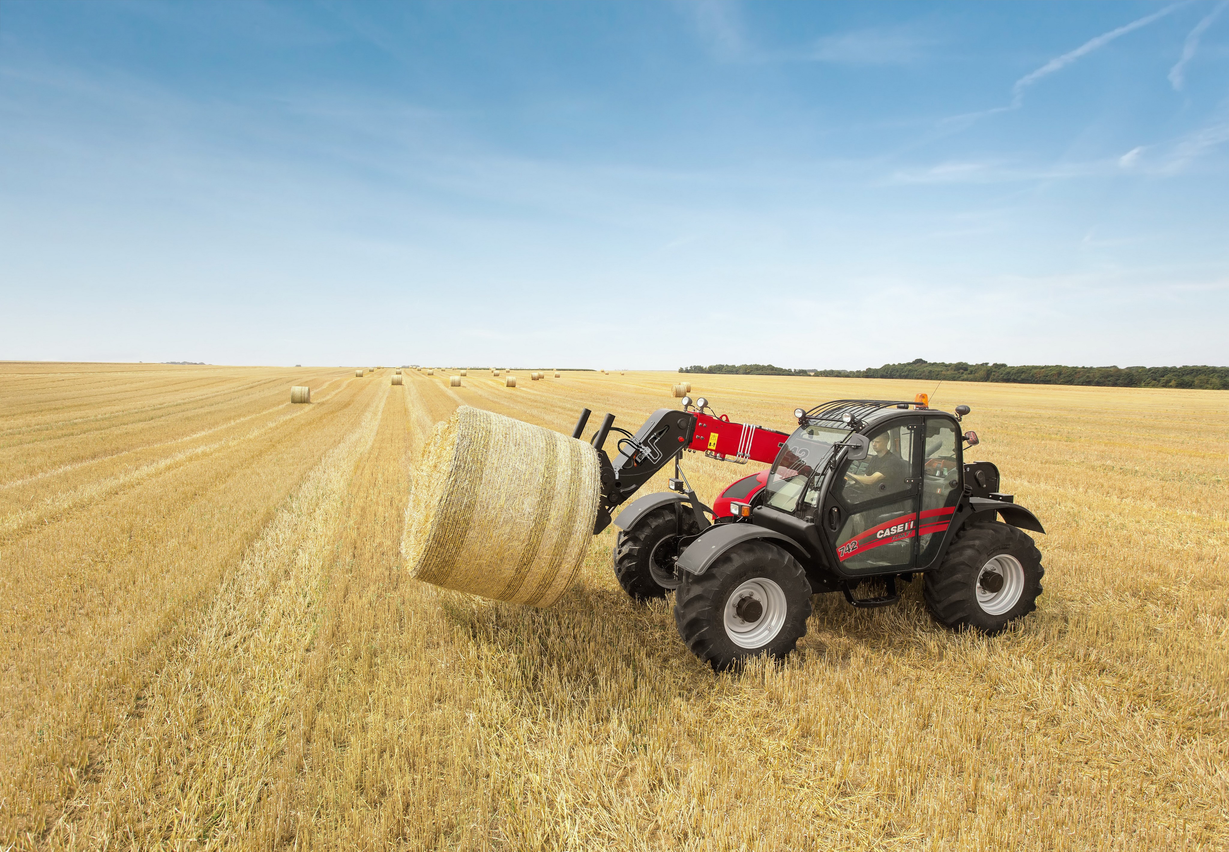 Case IH Farmlift 742 telehandler collecting hay bale HD Wallpaper