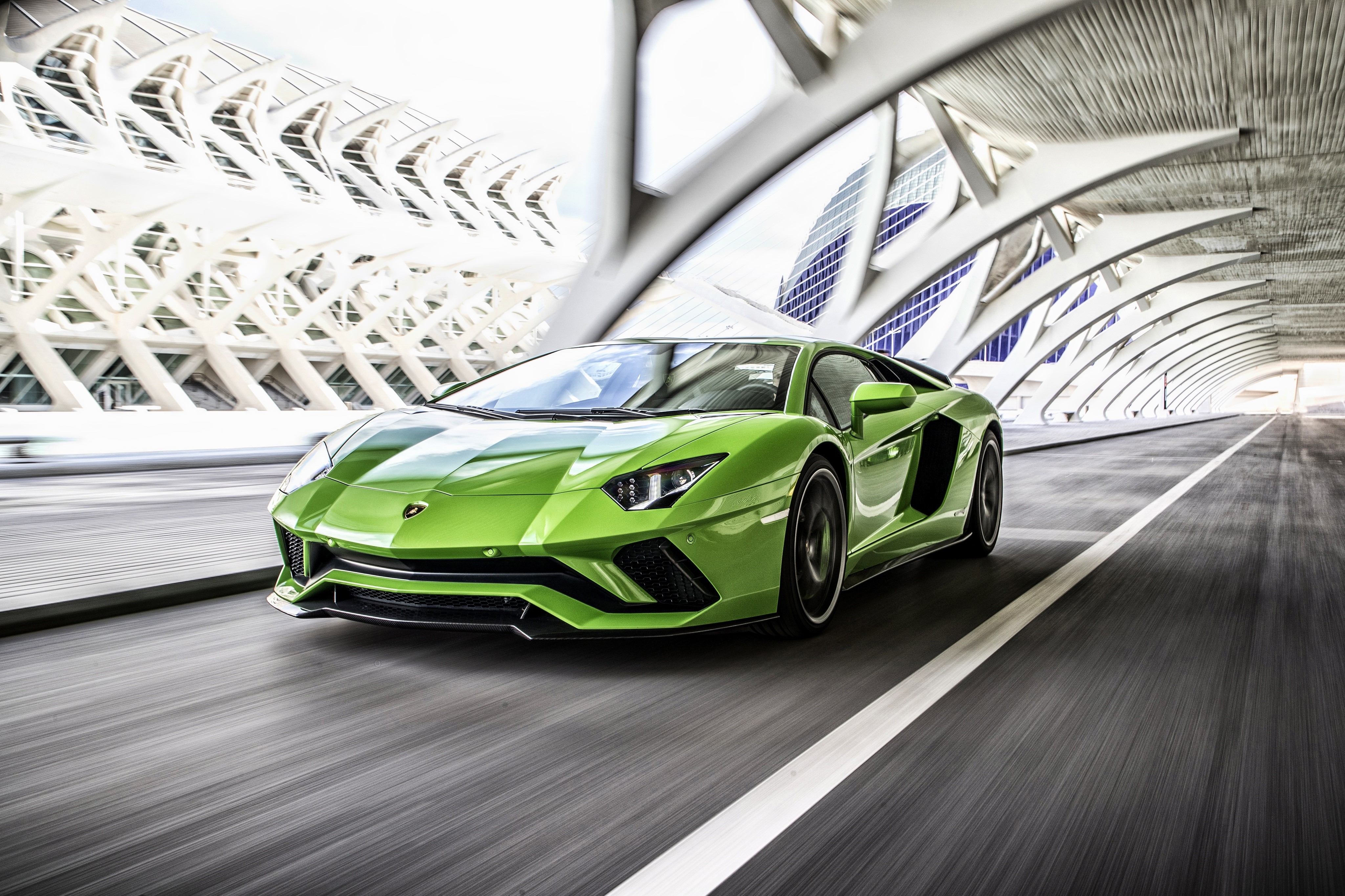 Green Lamborghini Aventador S driving on road HD Wallpaper
