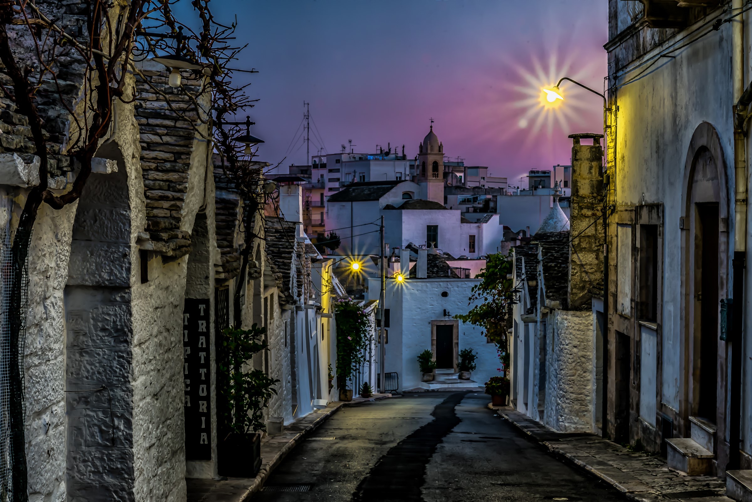 Street in Alberobello, Puglia, Italy at Dusk HD Wallpaper