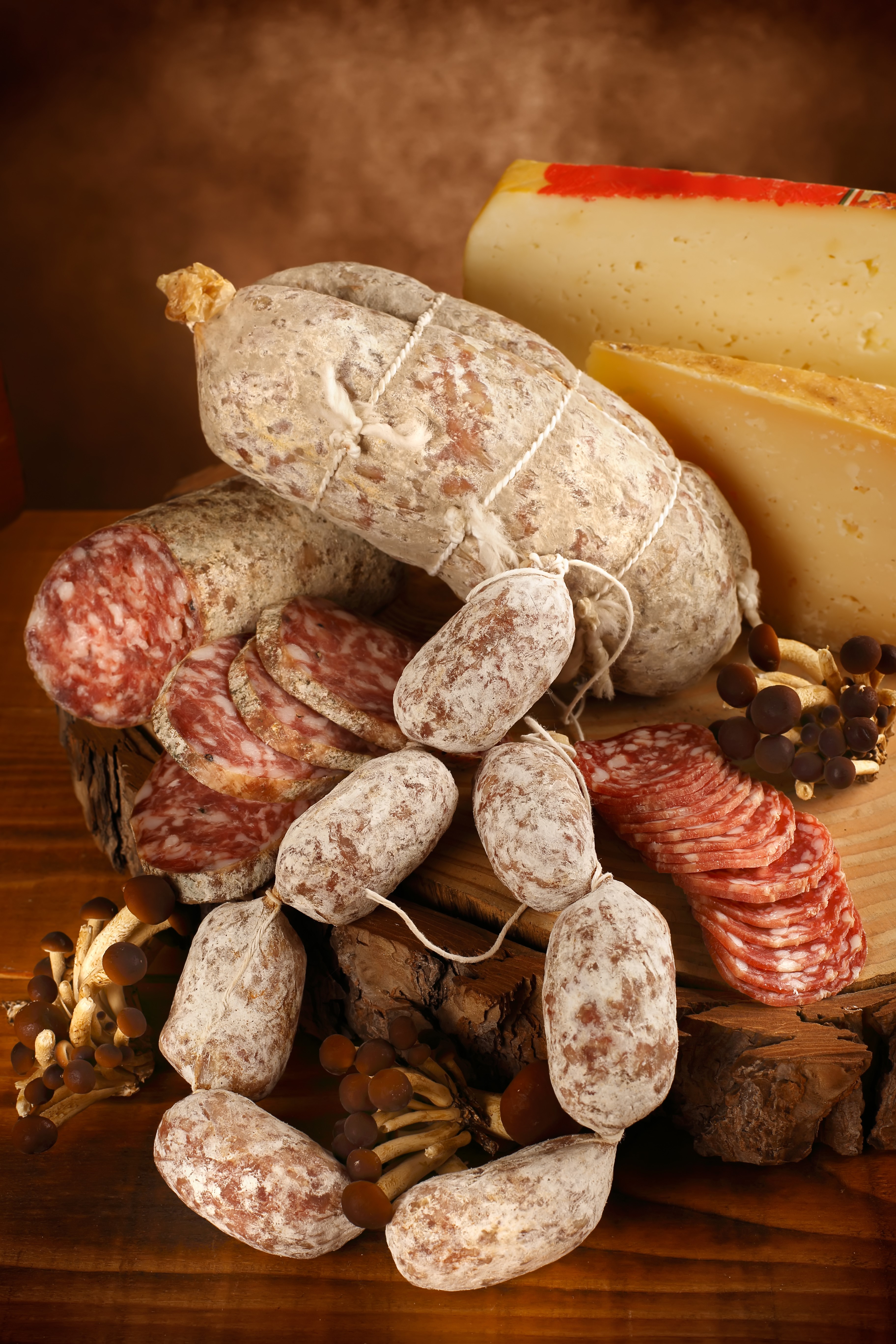 Assortment of cured sausages and cheese with mushrooms HD Phone Wallpaper