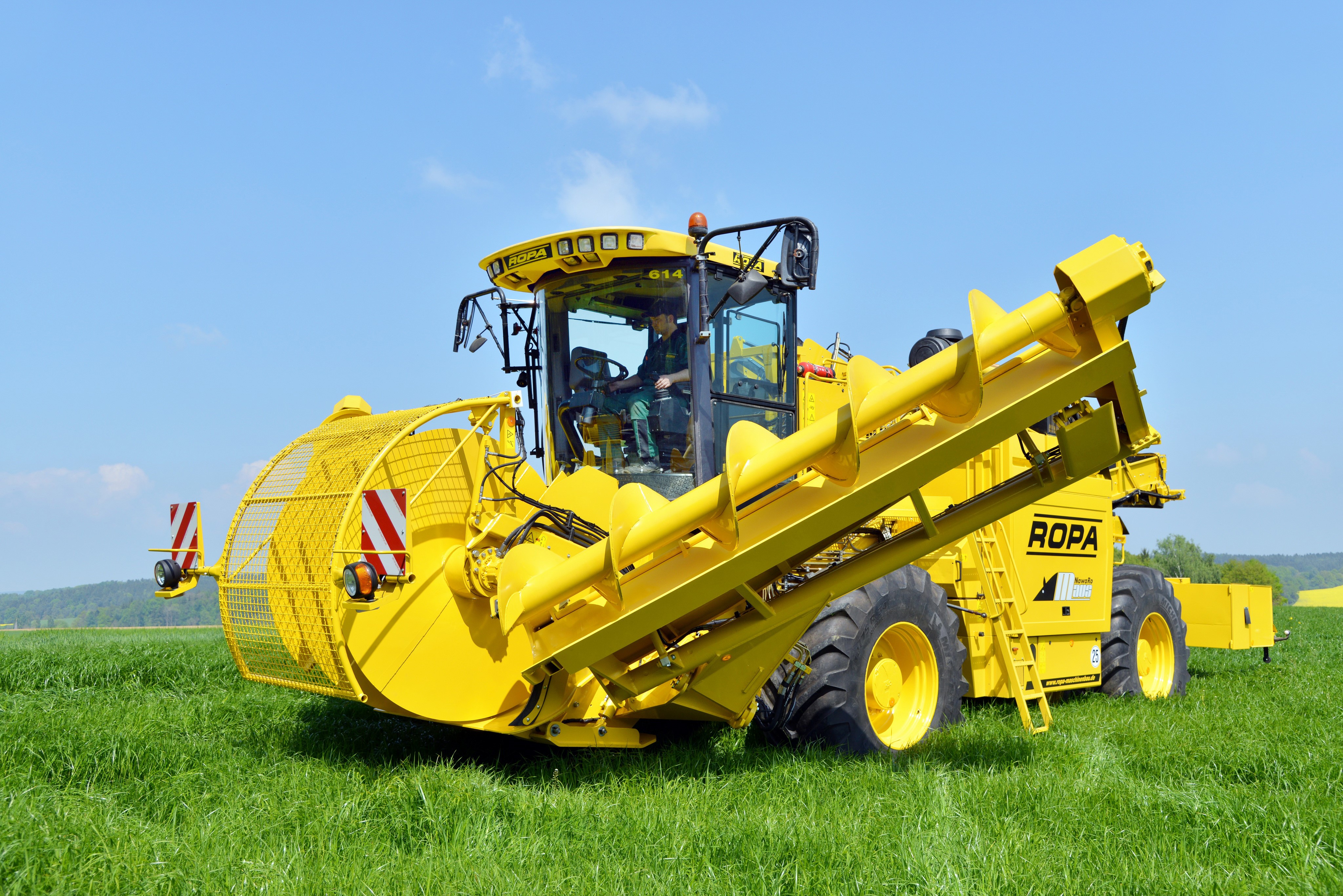 ROPA agricultural machinery in a field HD Wallpaper