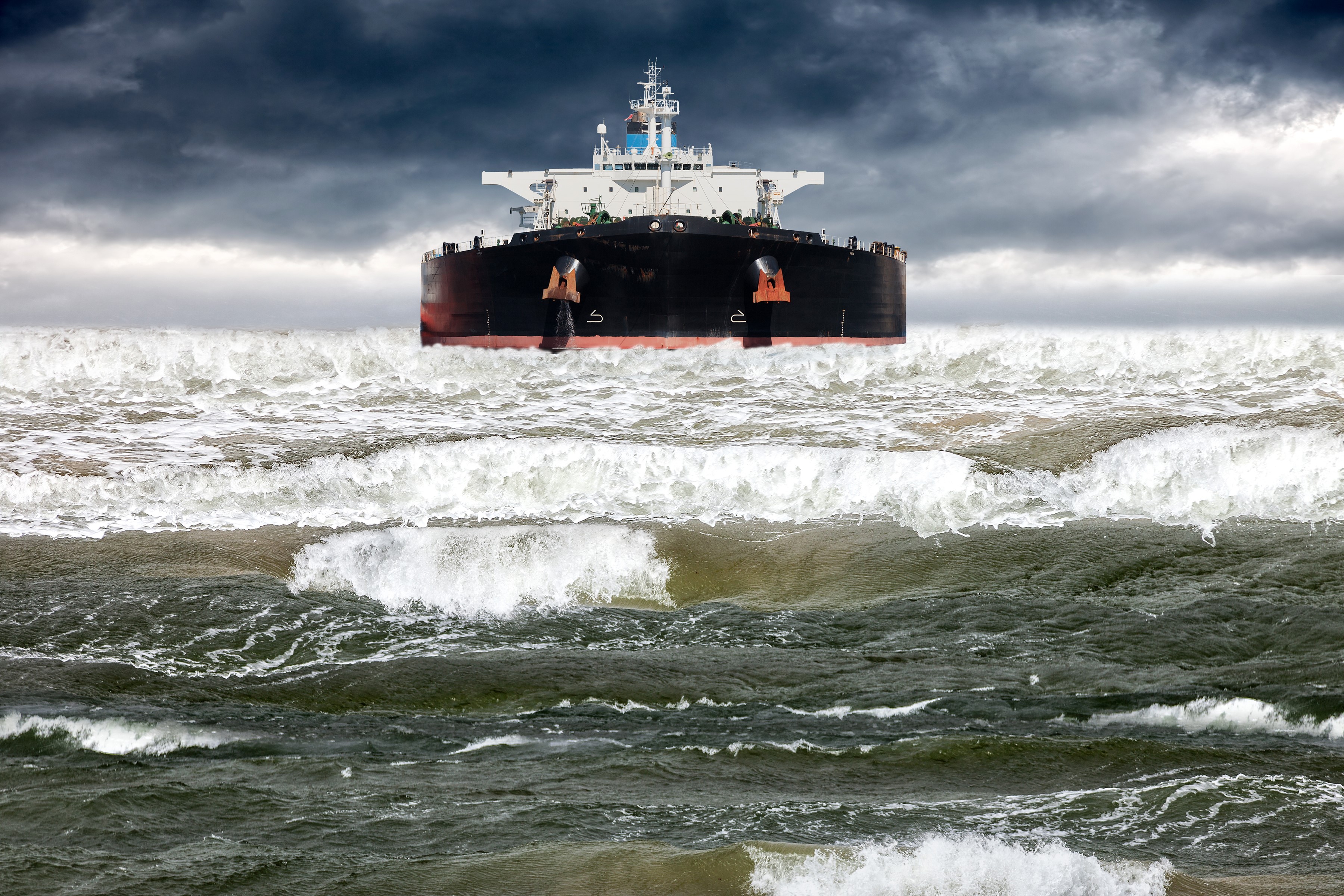 Tanker ship on rough seas under stormy skies HD Wallpaper