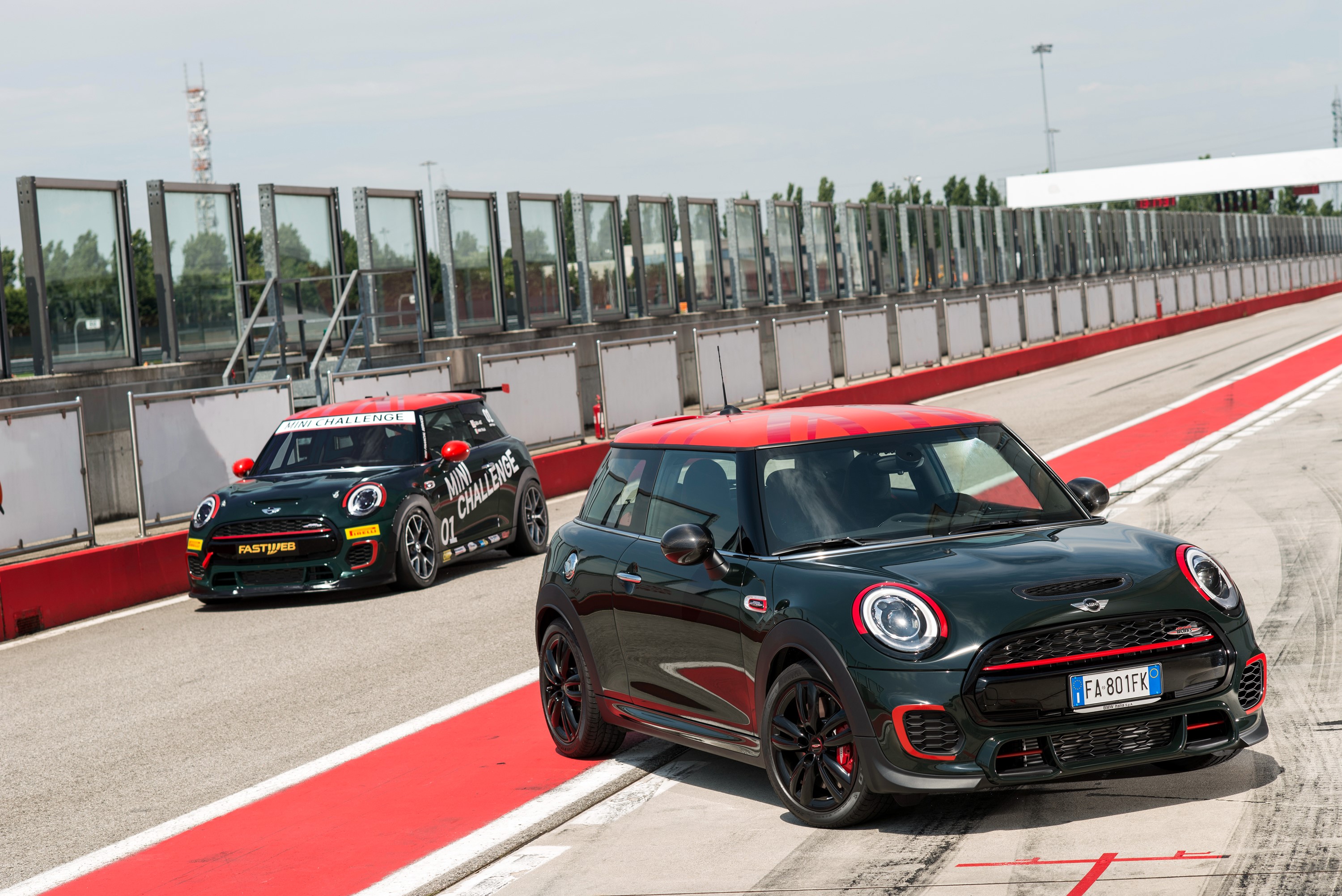Two Mini Challenge cars on a race track HD Wallpaper
