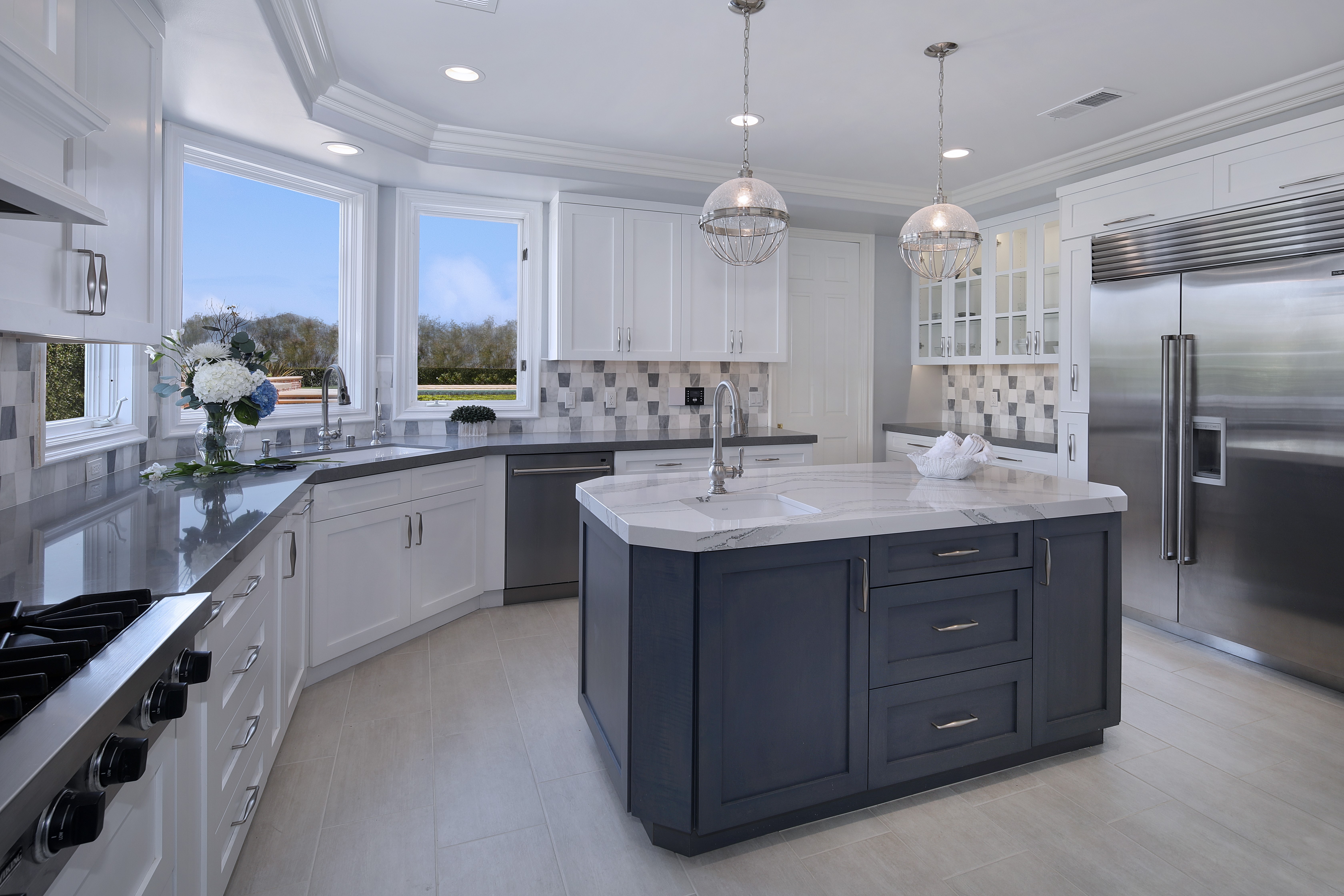 Modern Kitchen with Island and Stainless Steel Refrigerator HD Wallpaper
