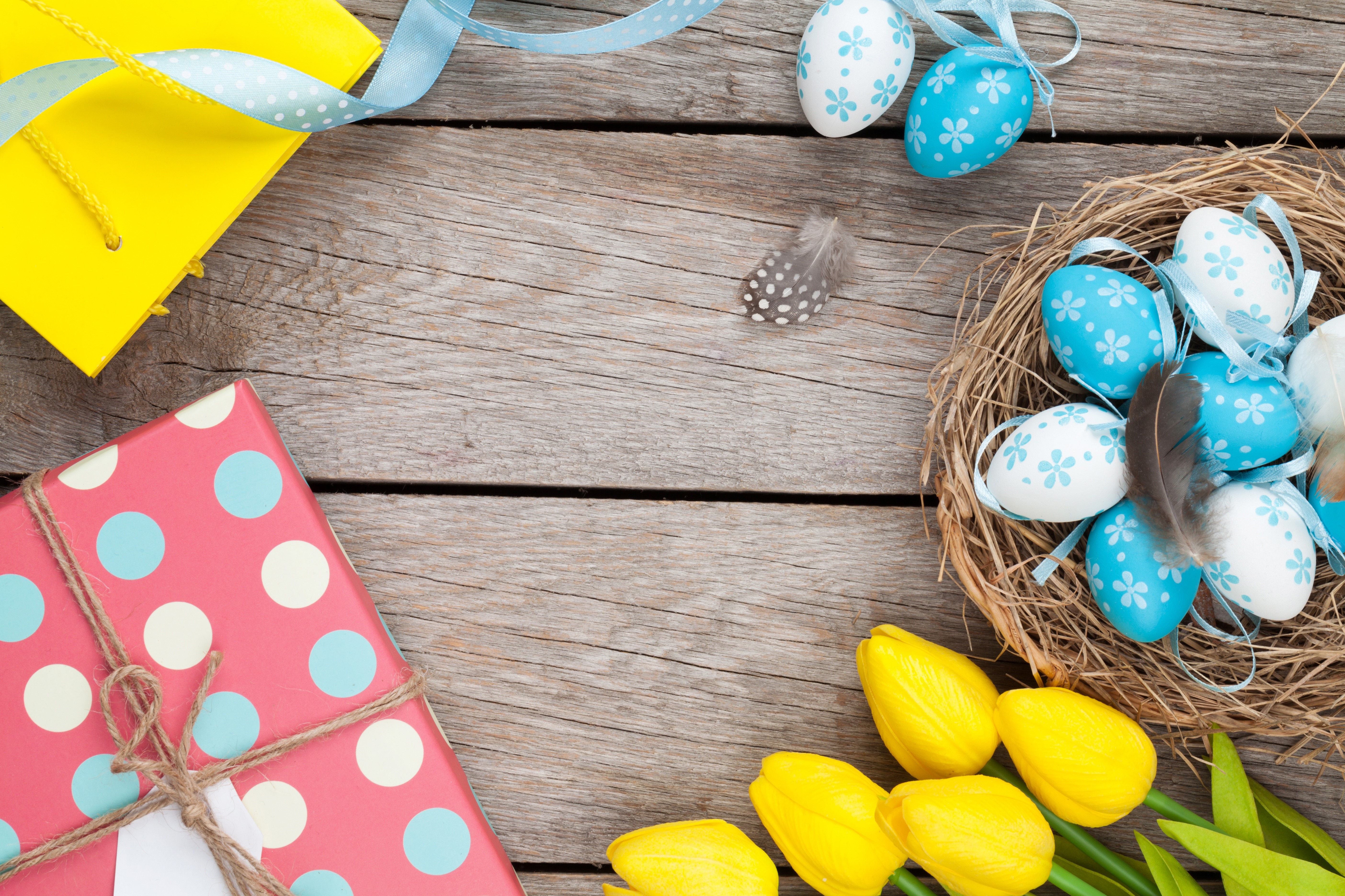 Easter Eggs in Nest with Tulips and Gifts HD Wallpaper