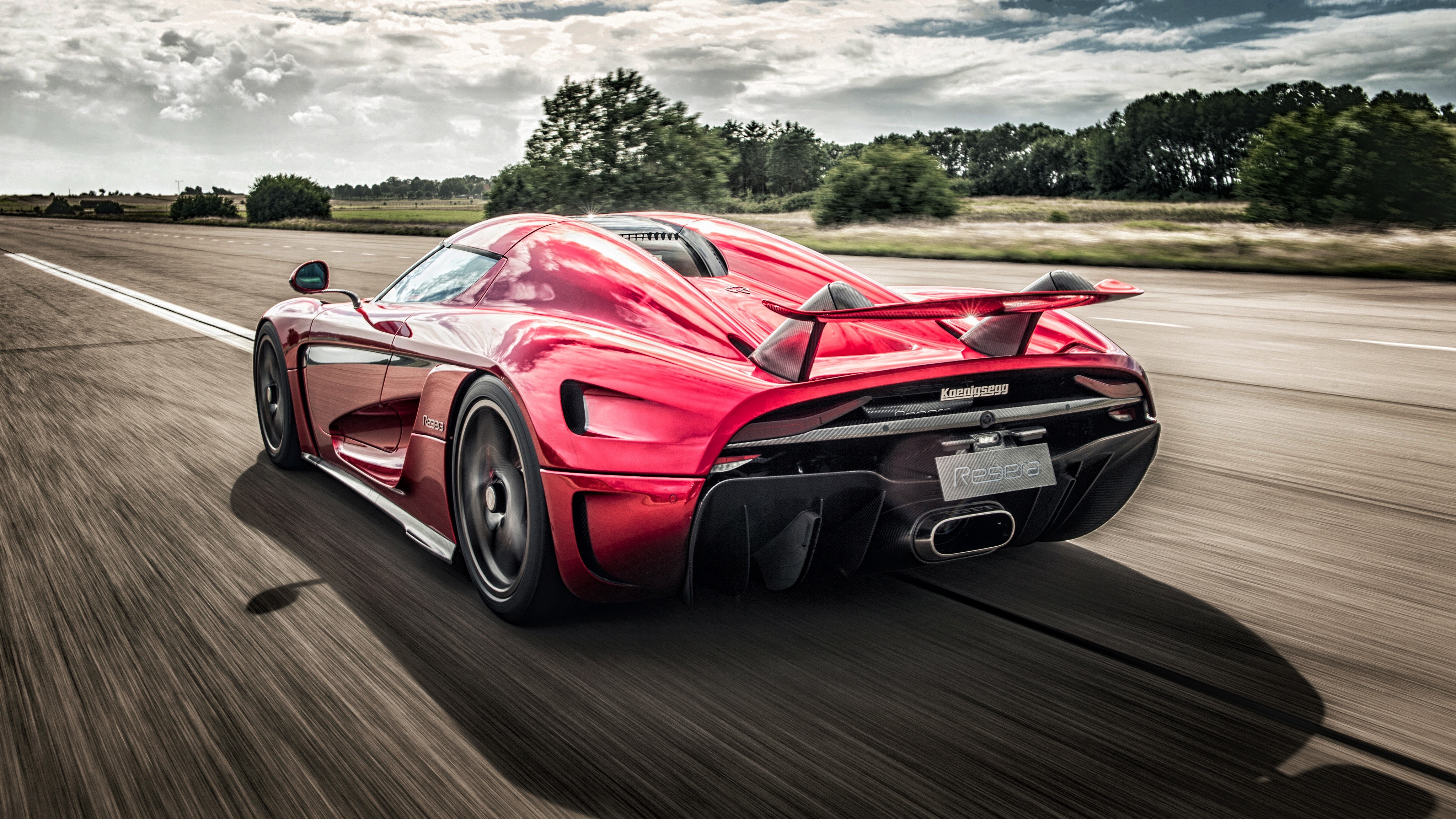 4K Koenigsegg Regera motion back view HD Wallpaper