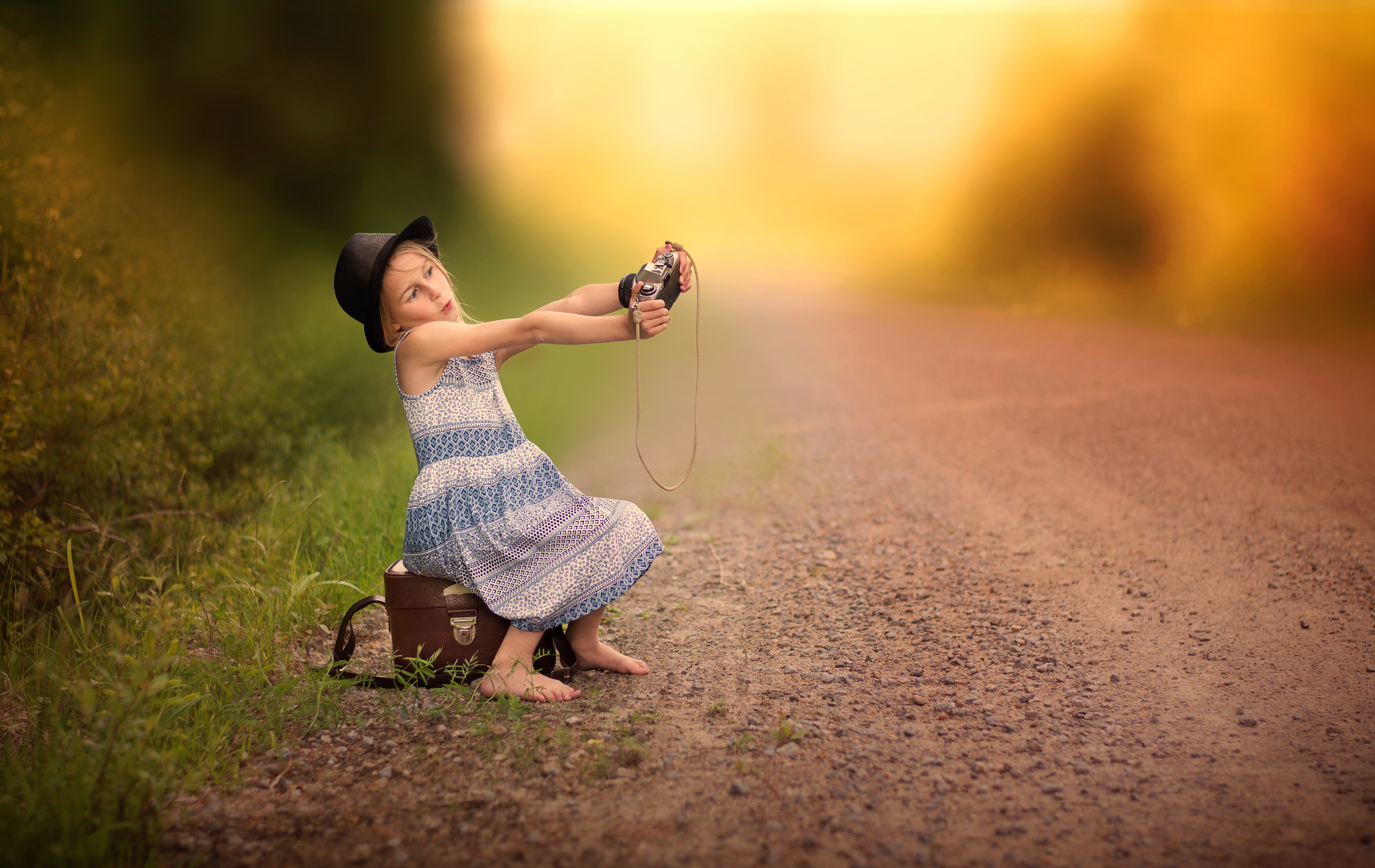 Girl in hat taking a selfie with a camera HD Wallpaper