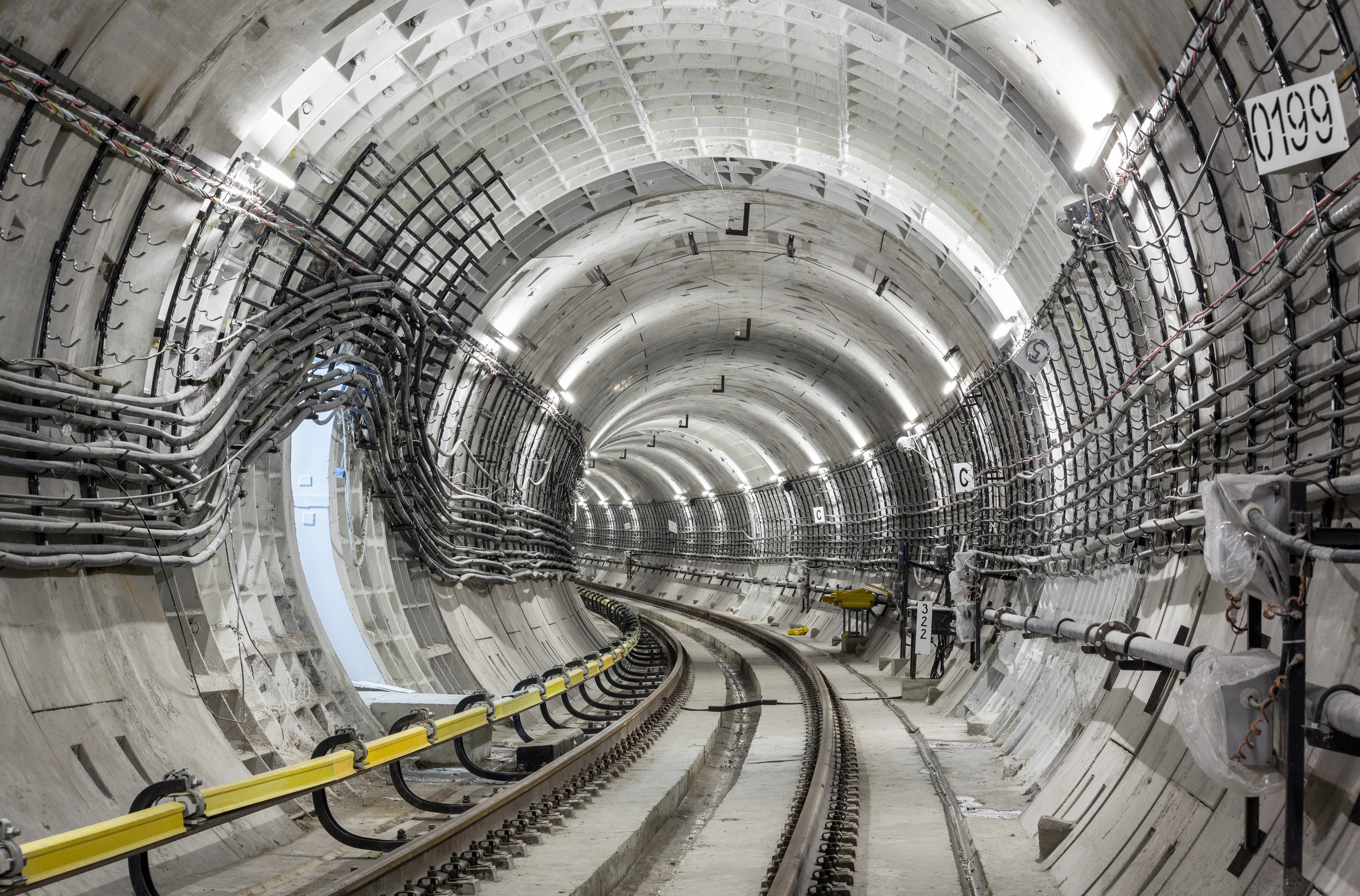 Railroad tunnel construction with cables and tracks HD Wallpaper