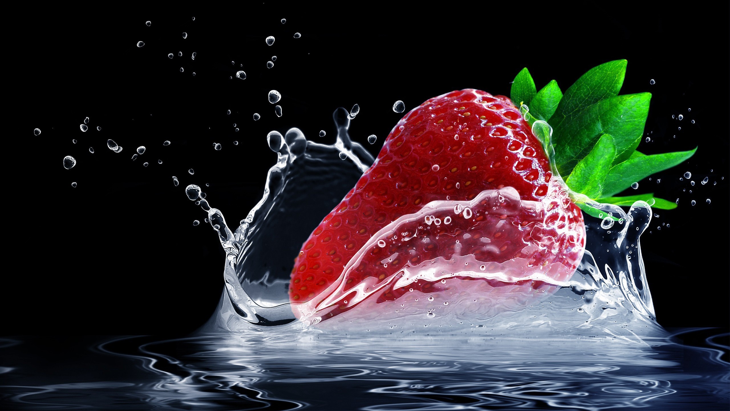 Strawberry splashing into water HD Wallpaper
