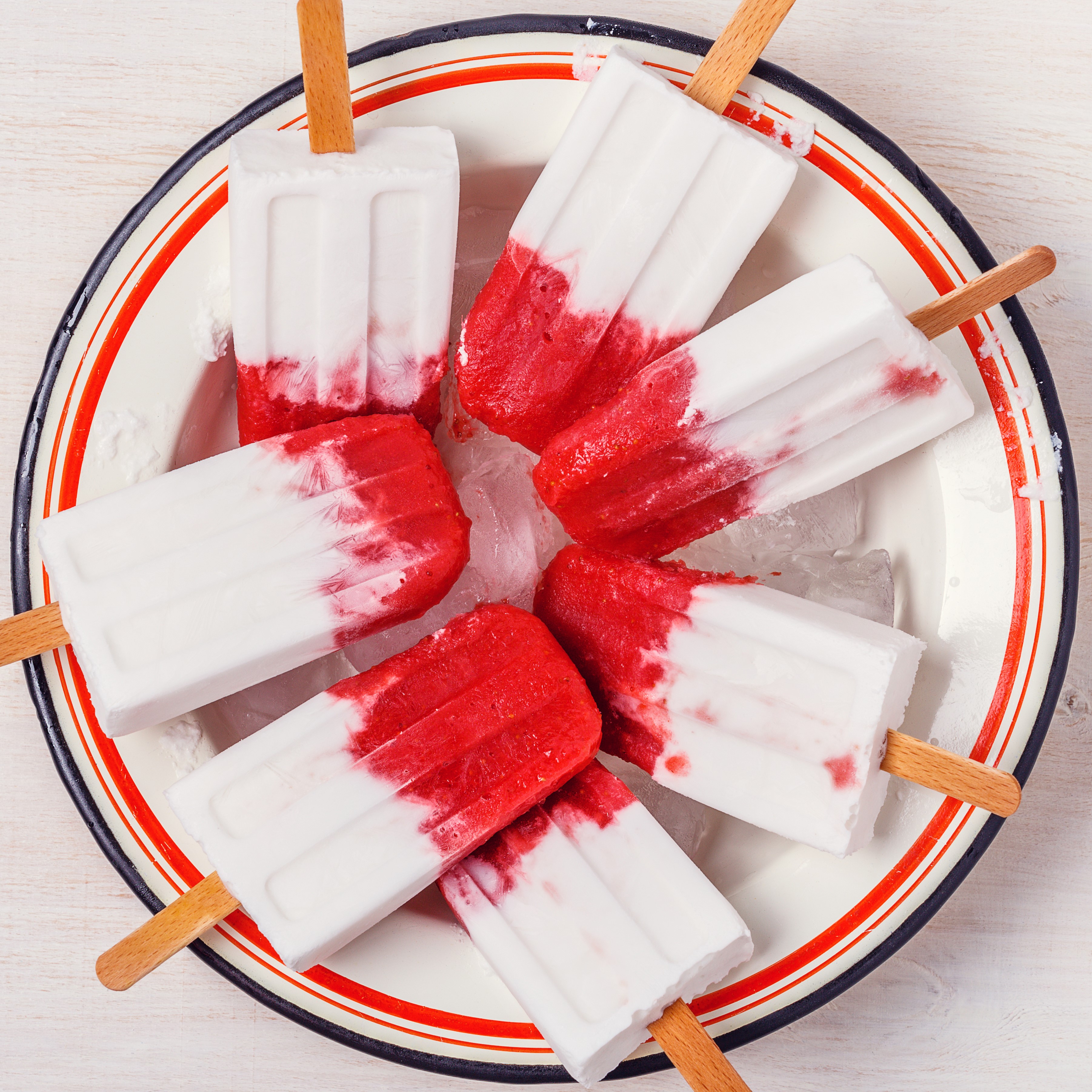 Strawberry and cream popsicles on a plate HD Wallpaper