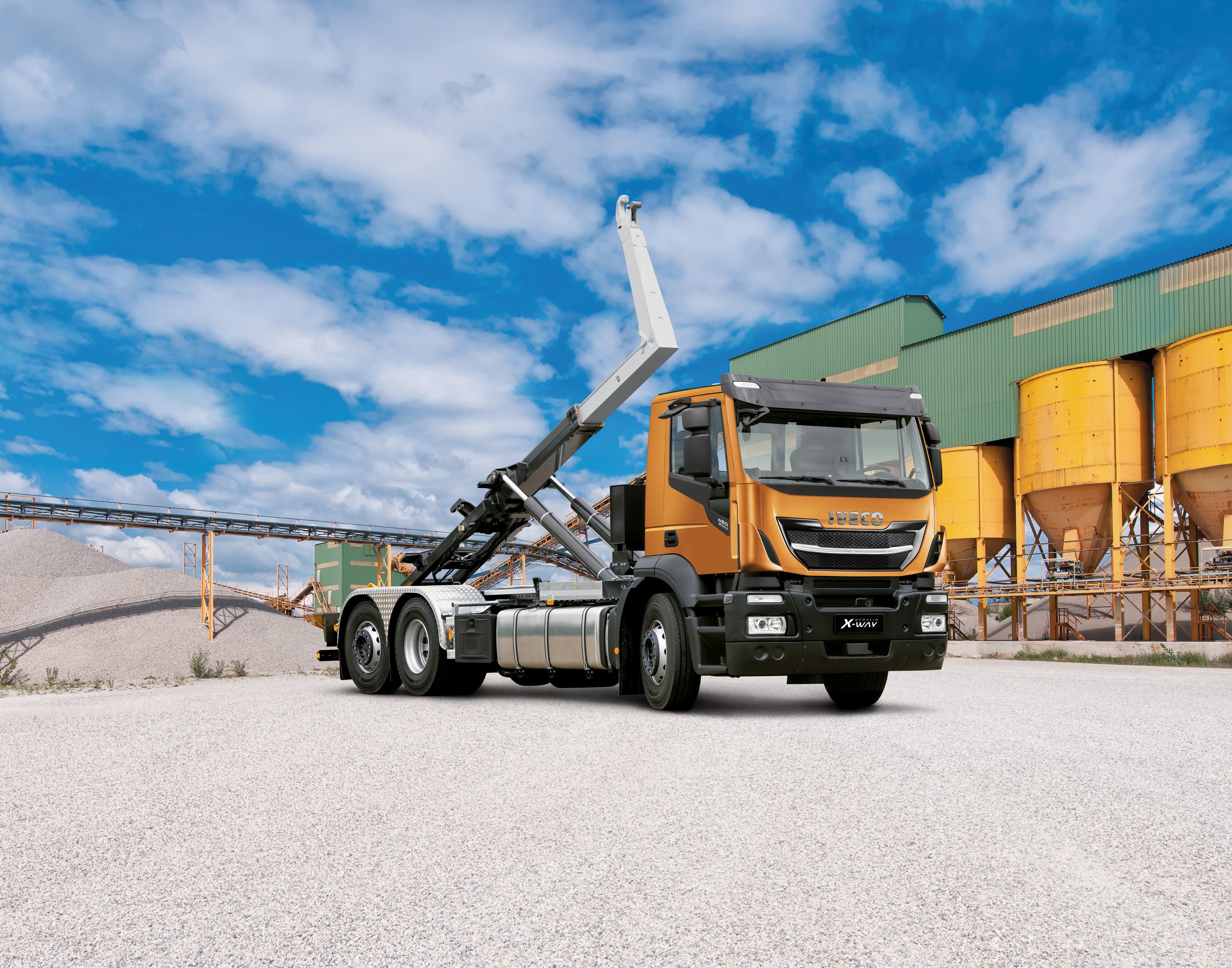 IVECO X-WAY hooklift truck at industrial site HD Wallpaper