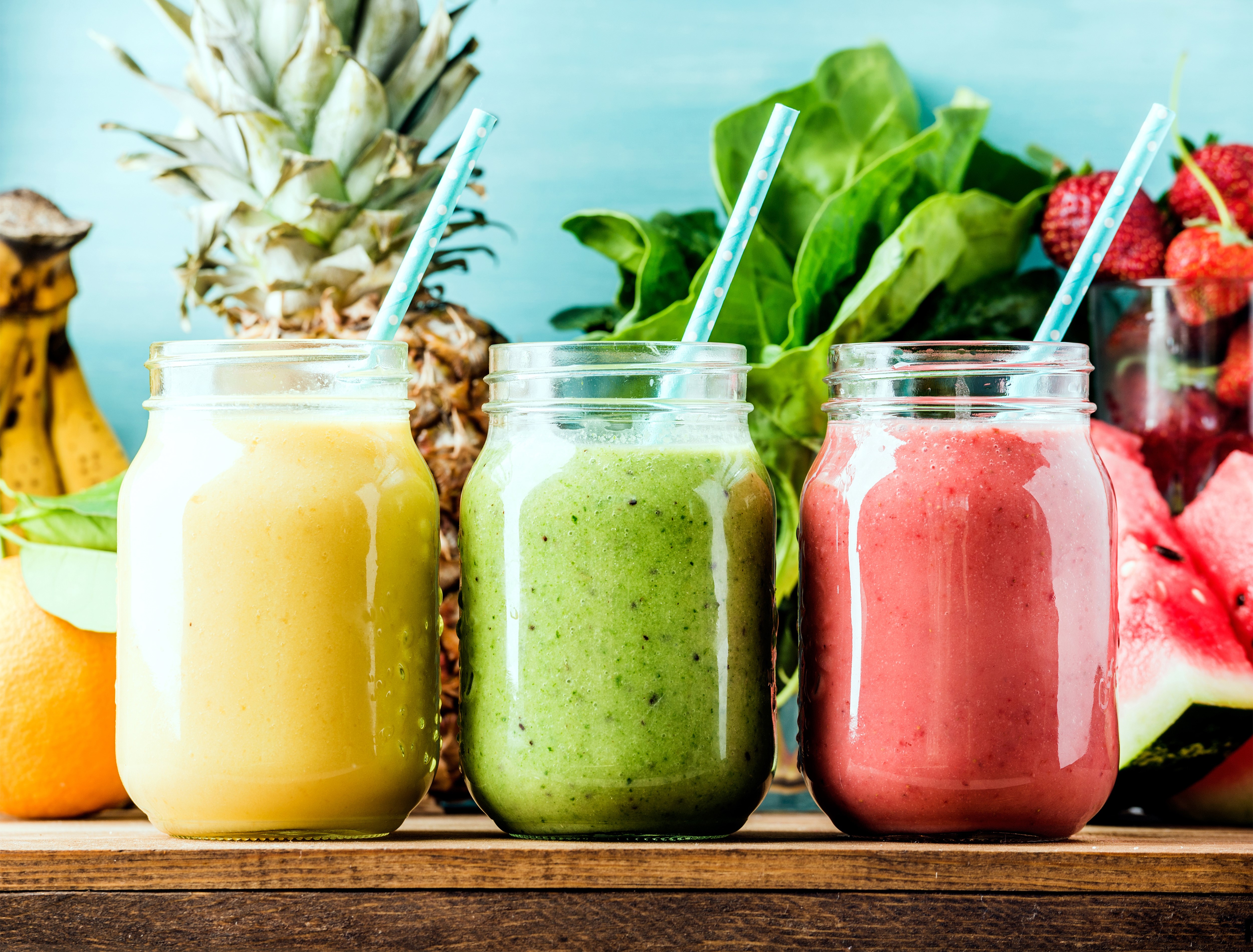 Three smoothies in jars with fruits HD Wallpaper