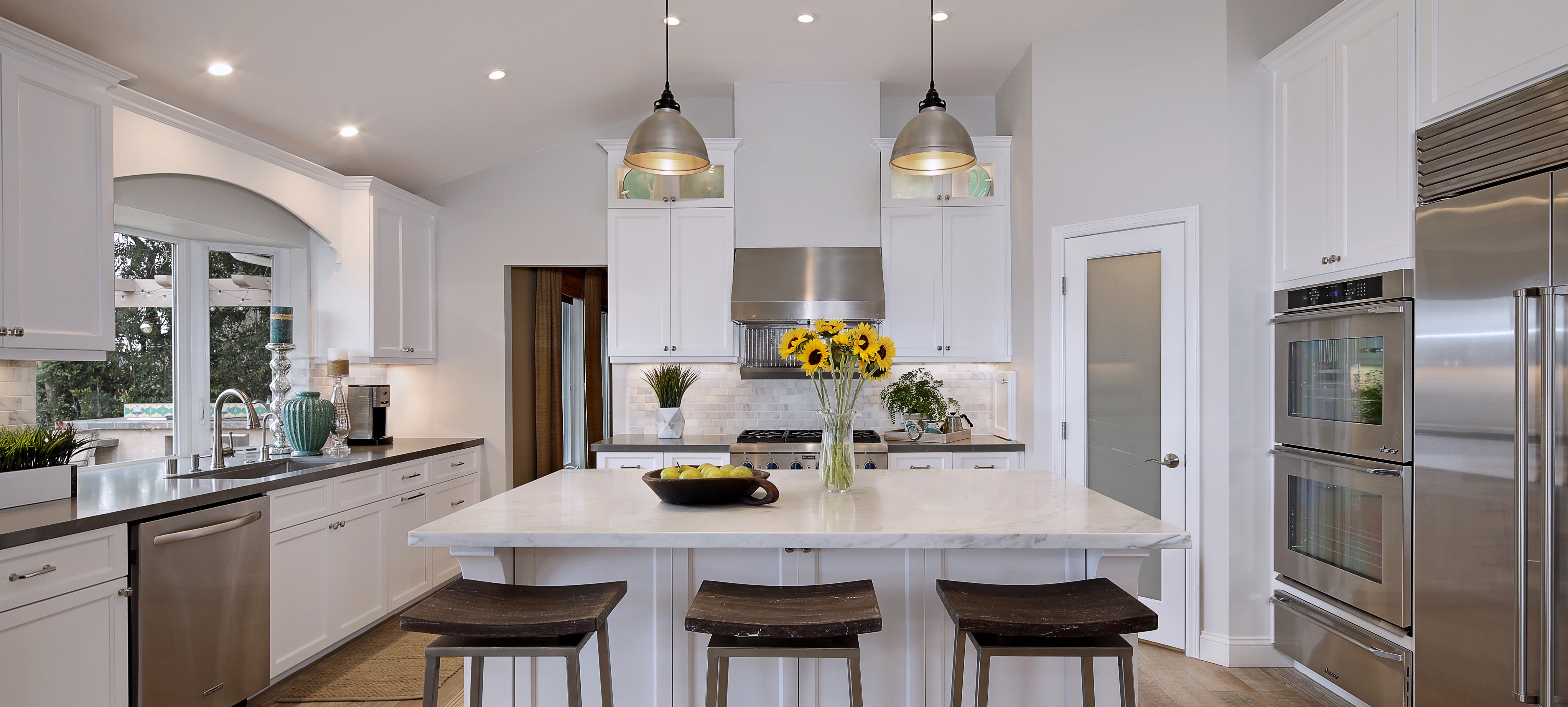 Modern Kitchen with Island and Stainless Steel Appliances HD Wallpaper