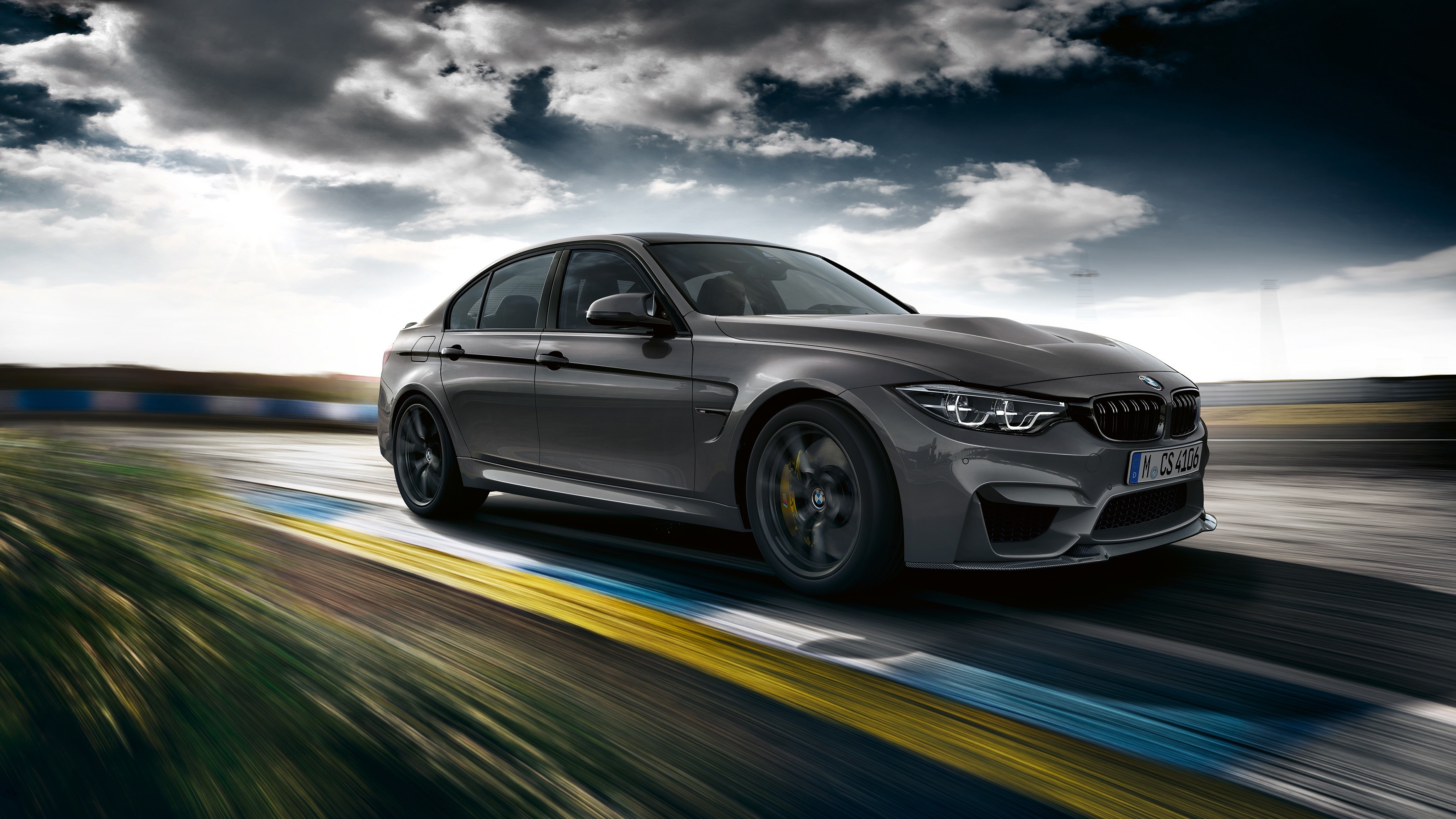 Grey BMW M3 on a Racetrack HD Wallpaper