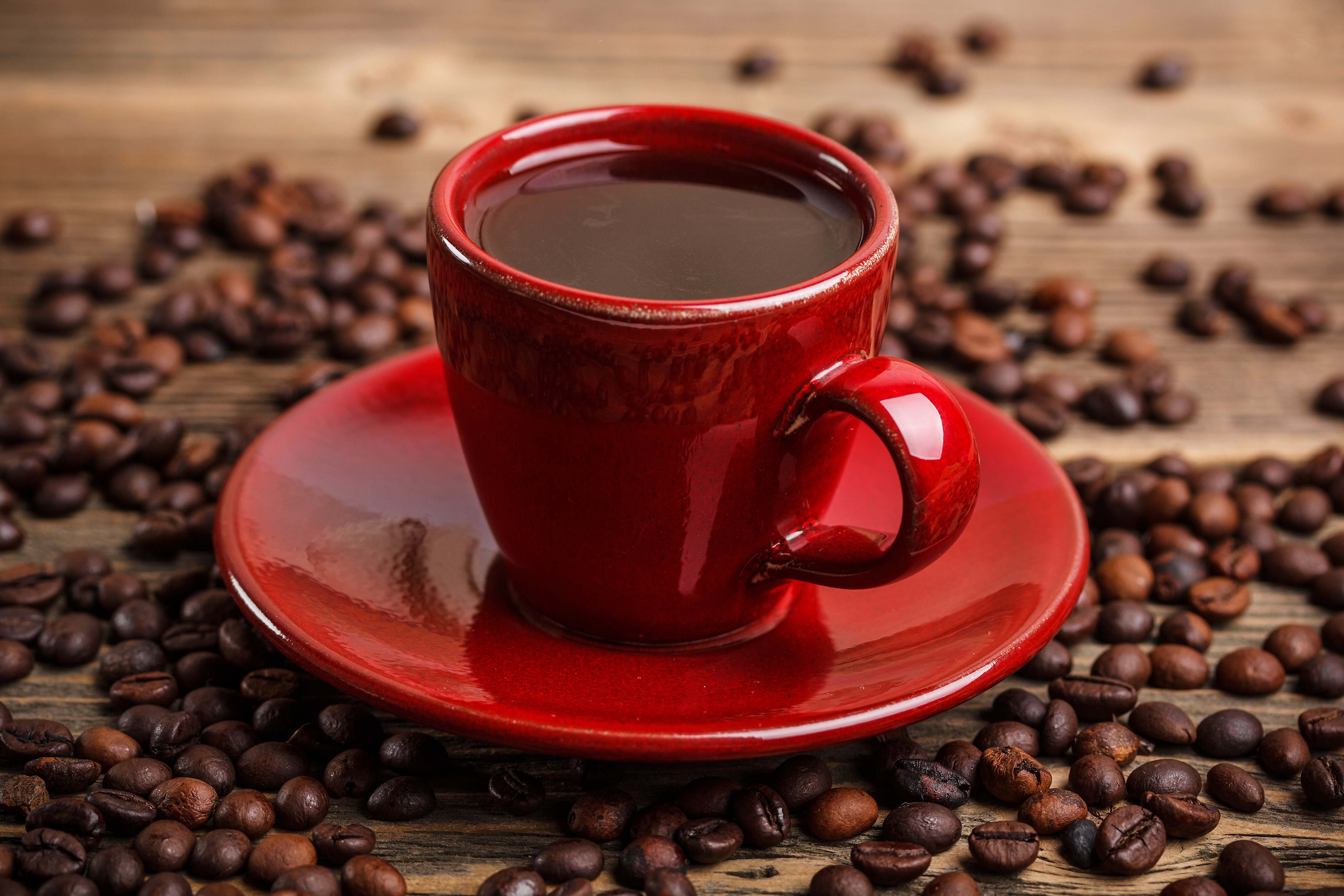 Red coffee cup with coffee beans HD Wallpaper