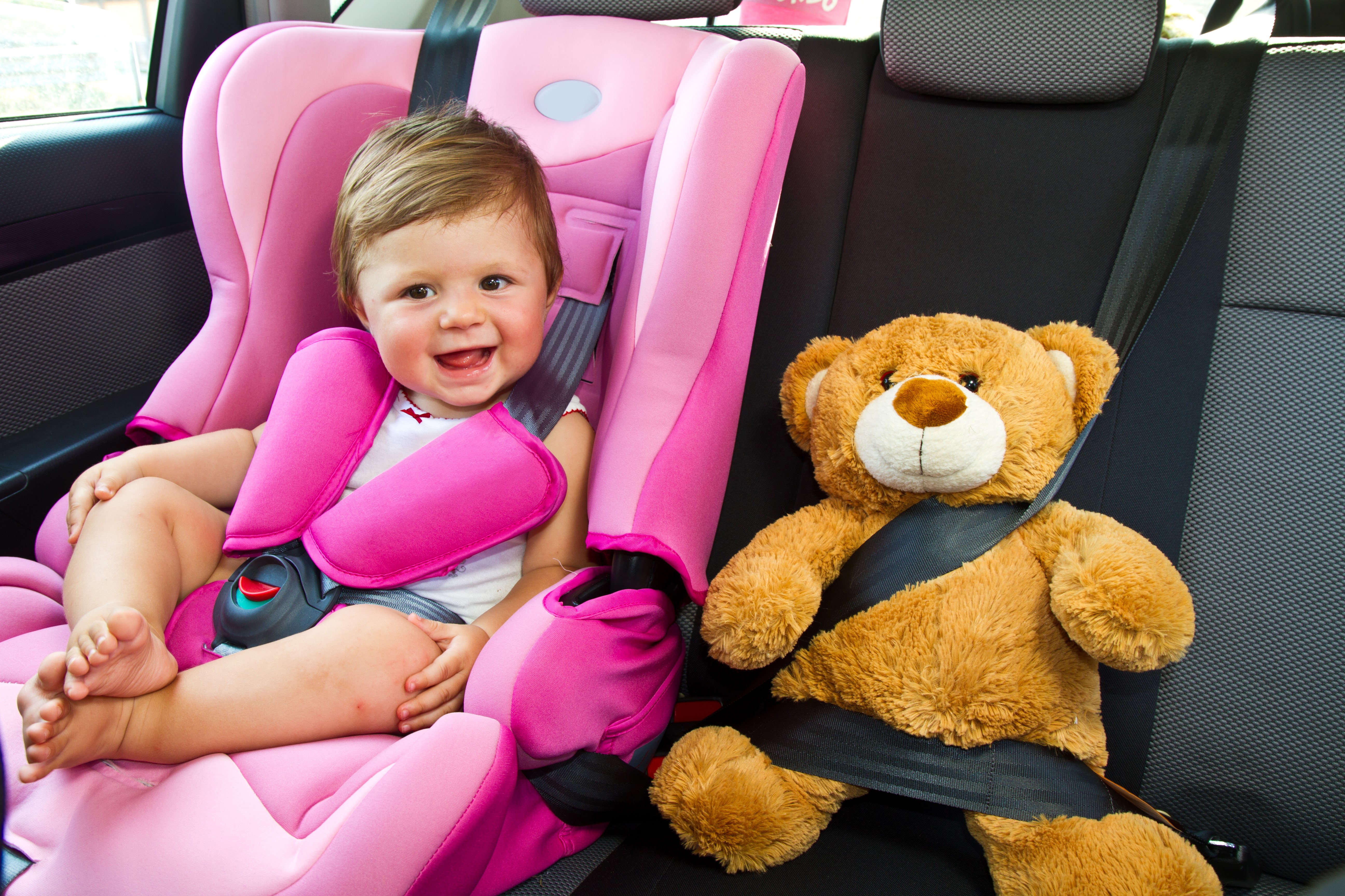 Baby and Teddy Bear in Car Seat HD Wallpaper
