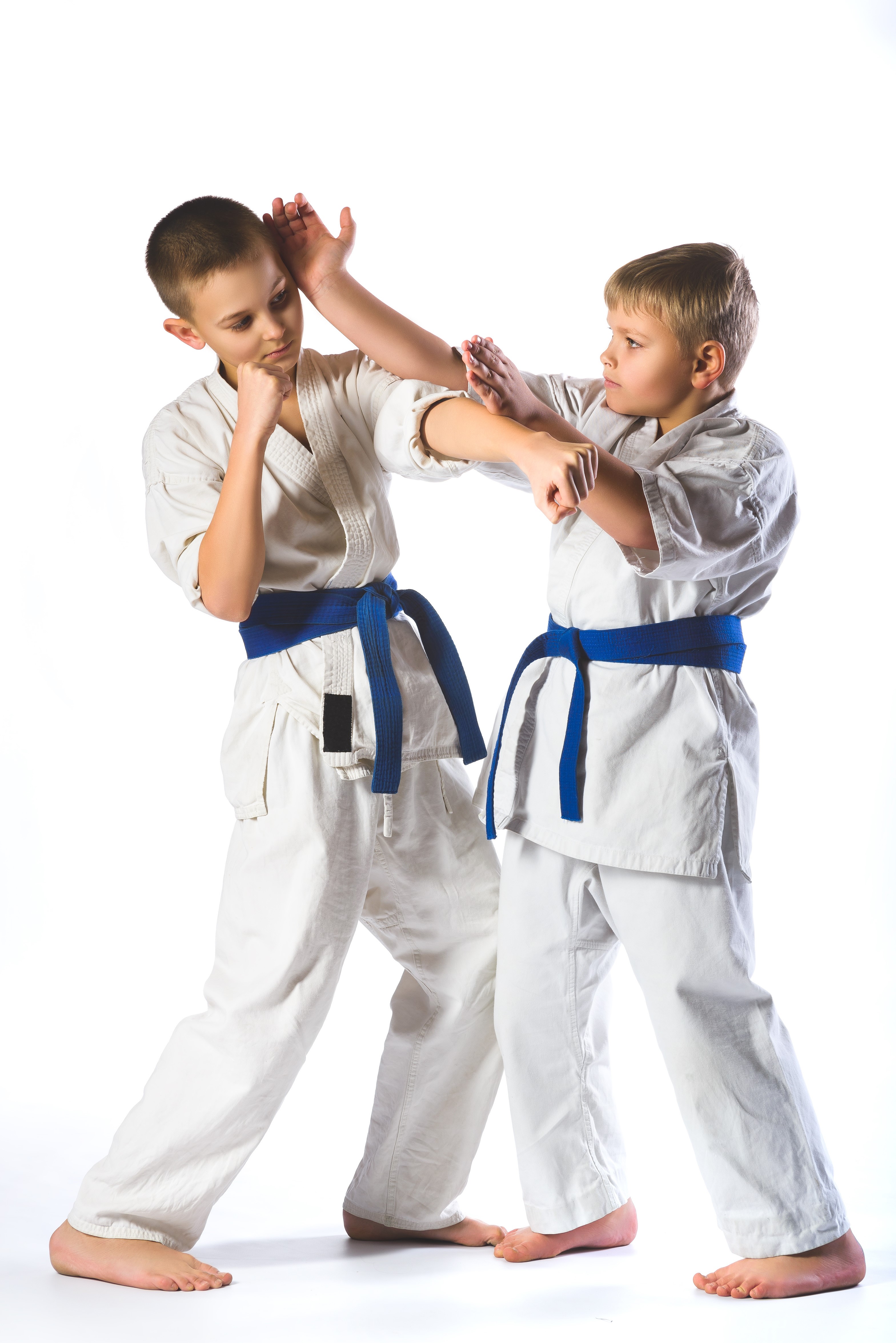 Two boys practicing karate HD Phone Wallpaper