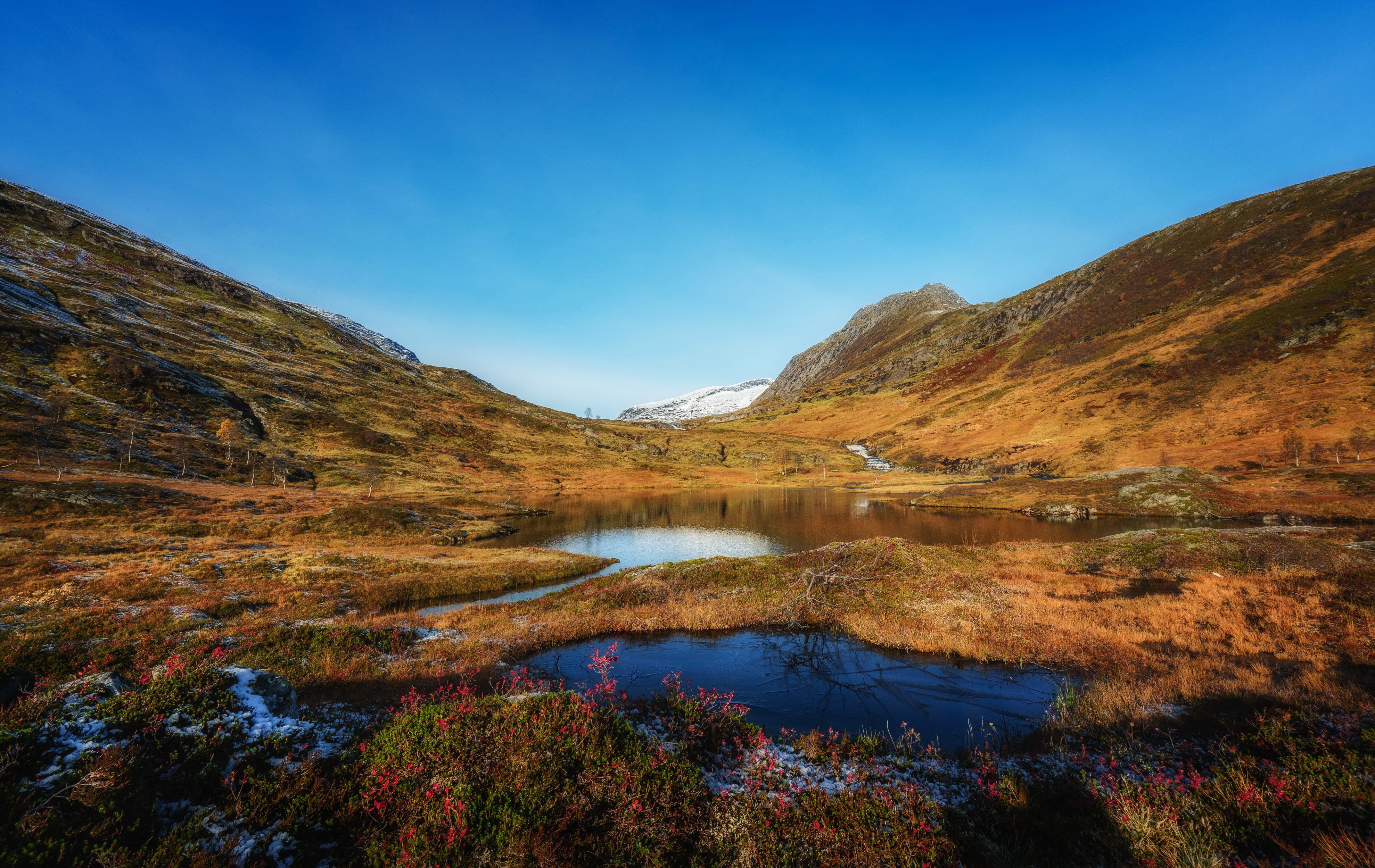 Autumn landscape with lake and mountains in Sulitjelma, Norway HD Wallpaper