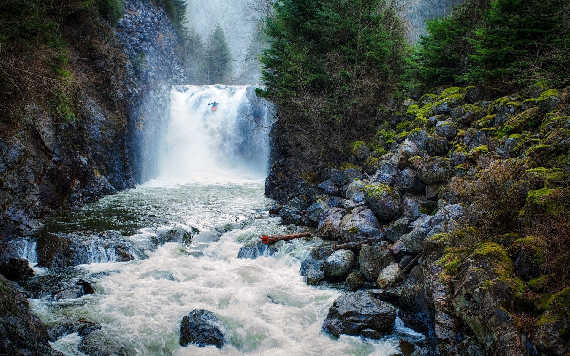 Kayaker goes over a waterfall HD Wallpaper