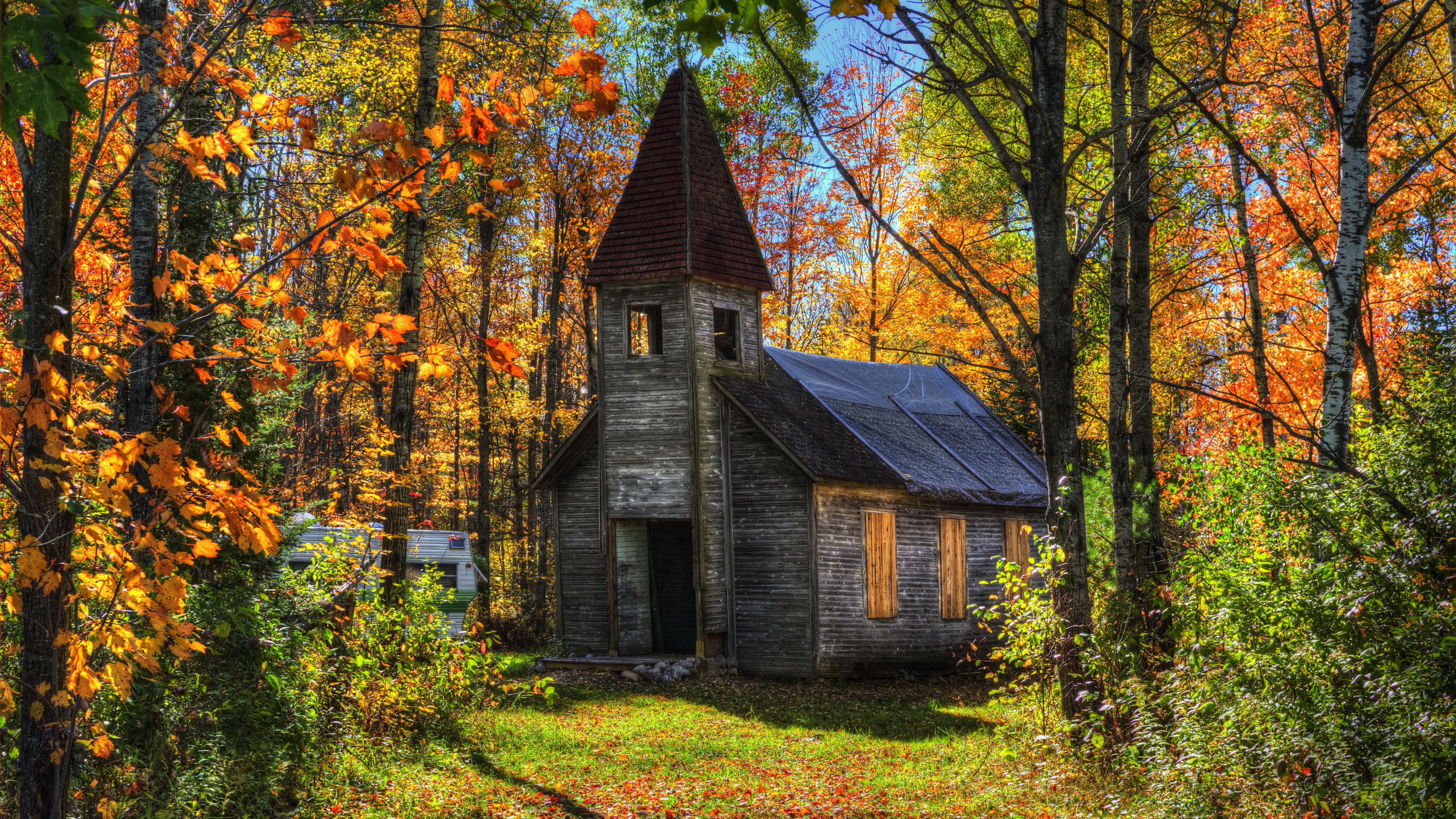 Abandoned church in autumn forest HD Wallpaper