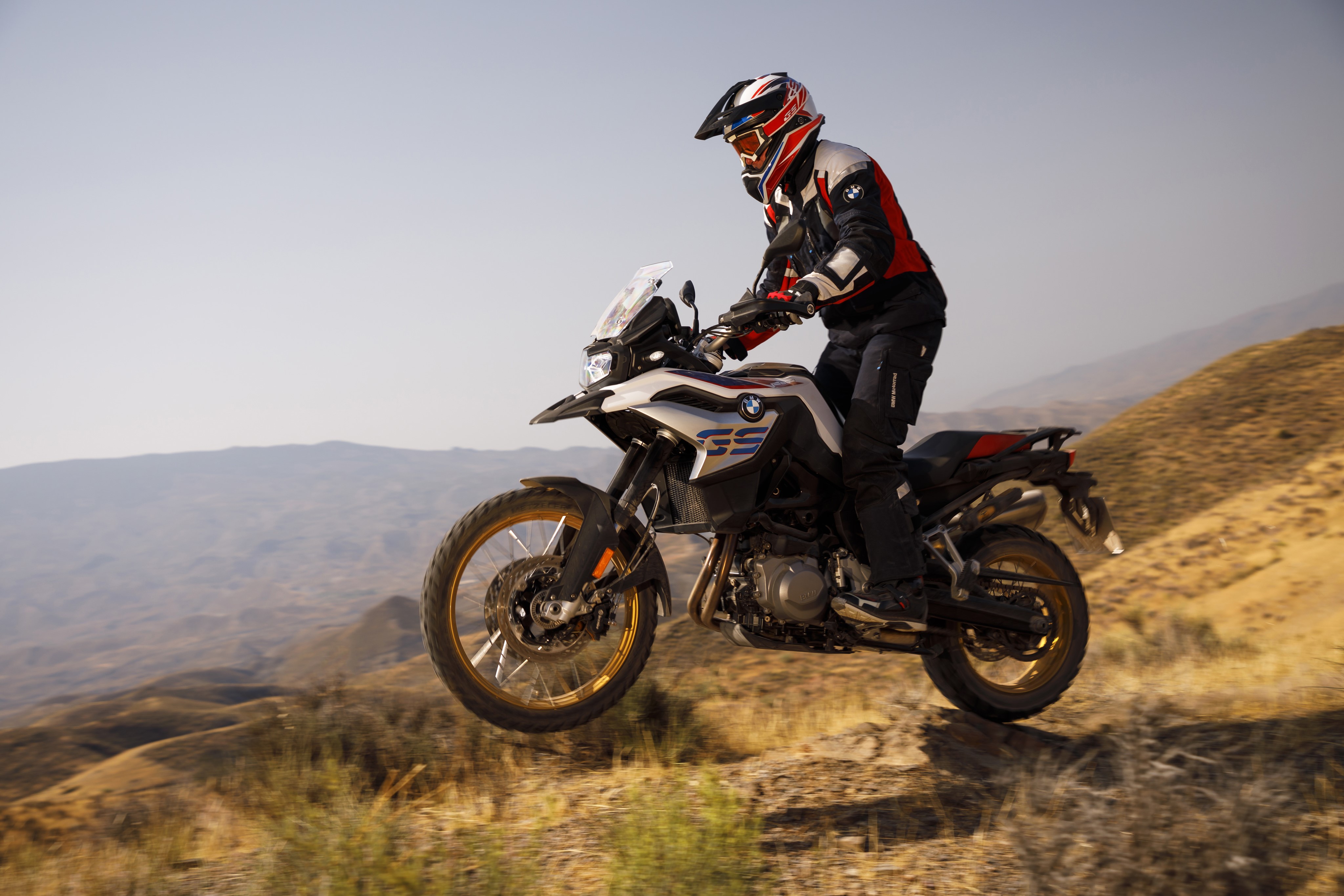 Motorcyclist riding a BMW 2018 F 850 GS motorcycle HD Wallpaper