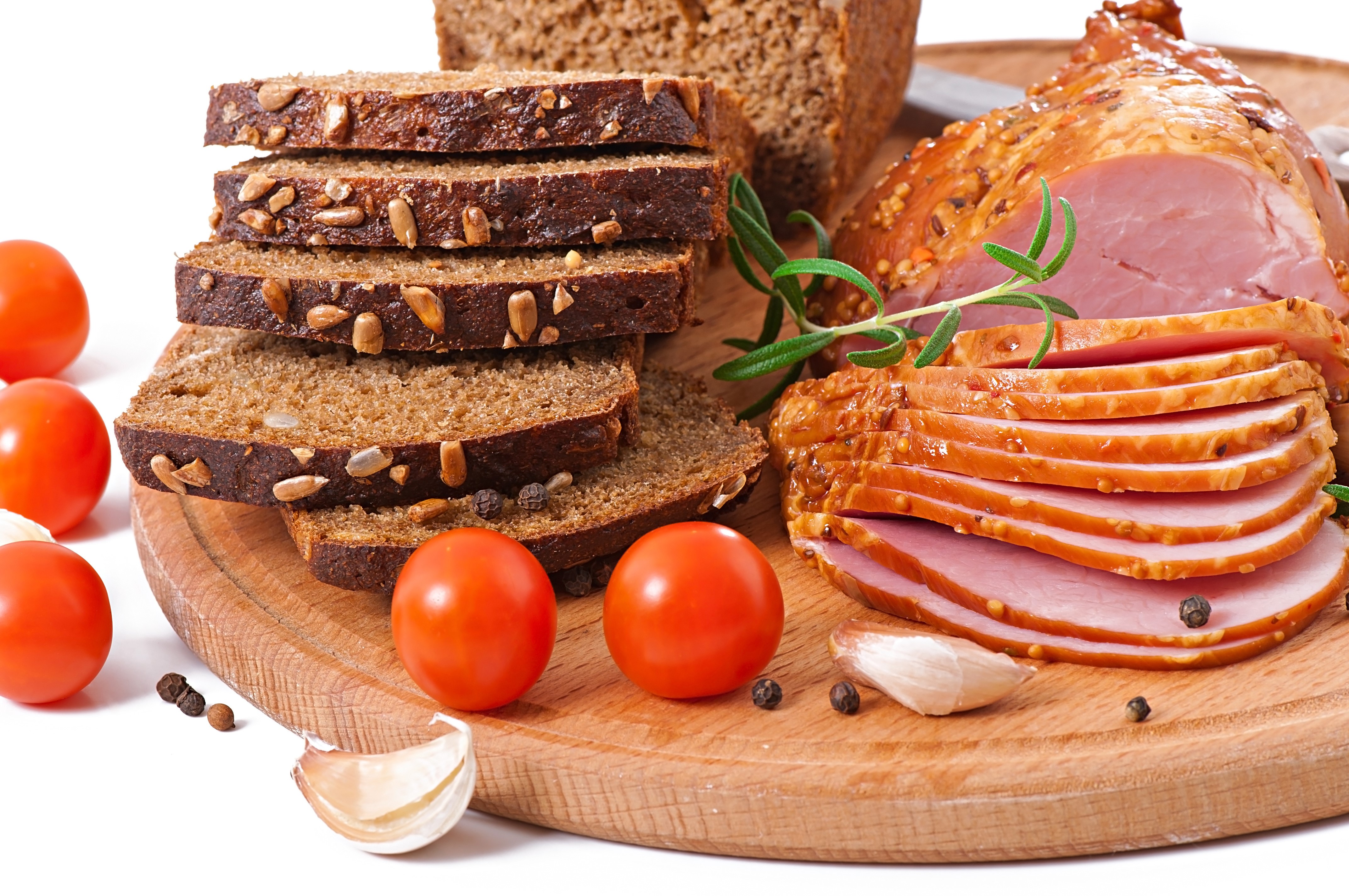 Ham, Bread, Tomatoes, and Garlic on a Cutting Board HD Wallpaper