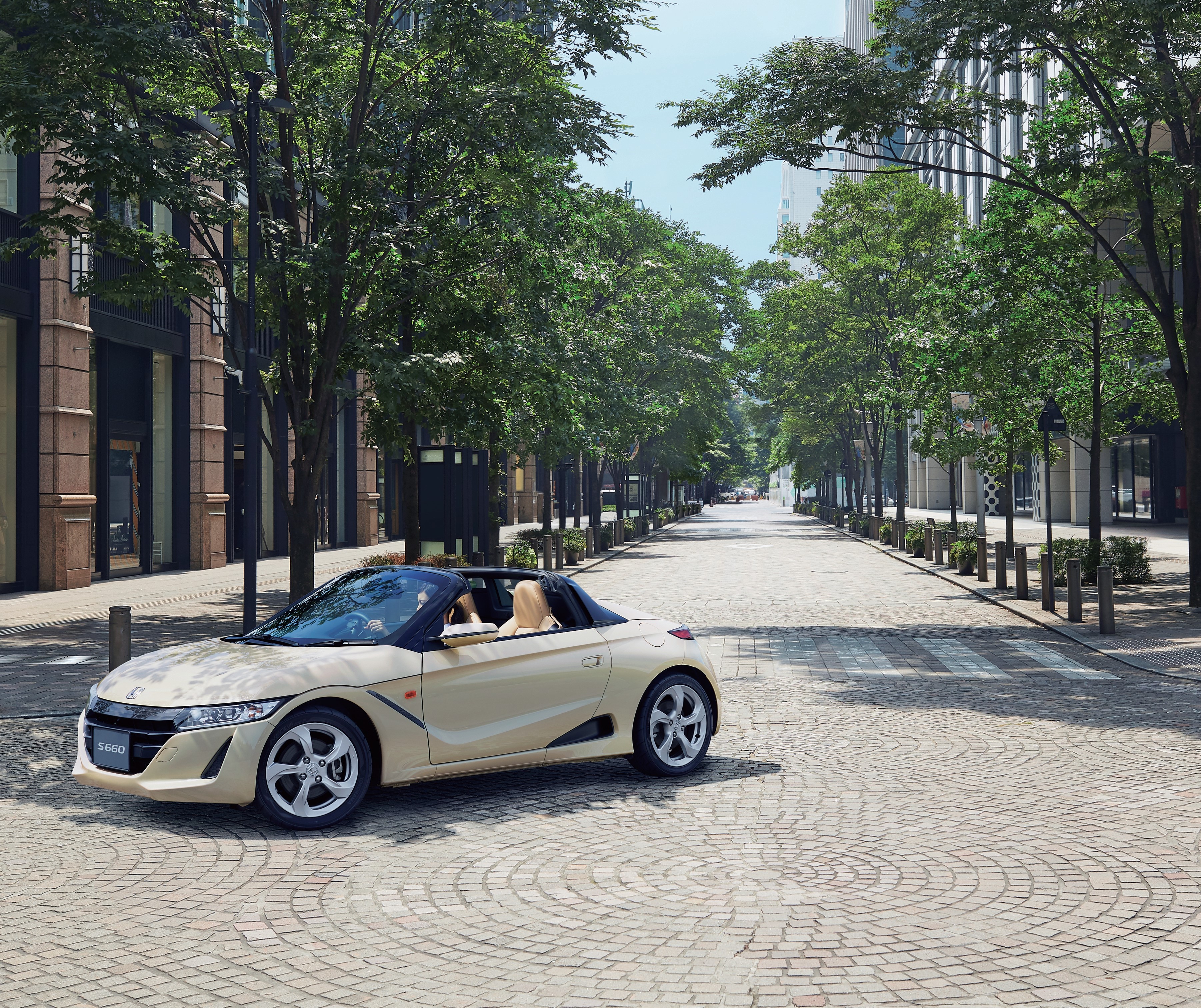 Honda S660 Cabriolet on a tree-lined street HD Wallpaper