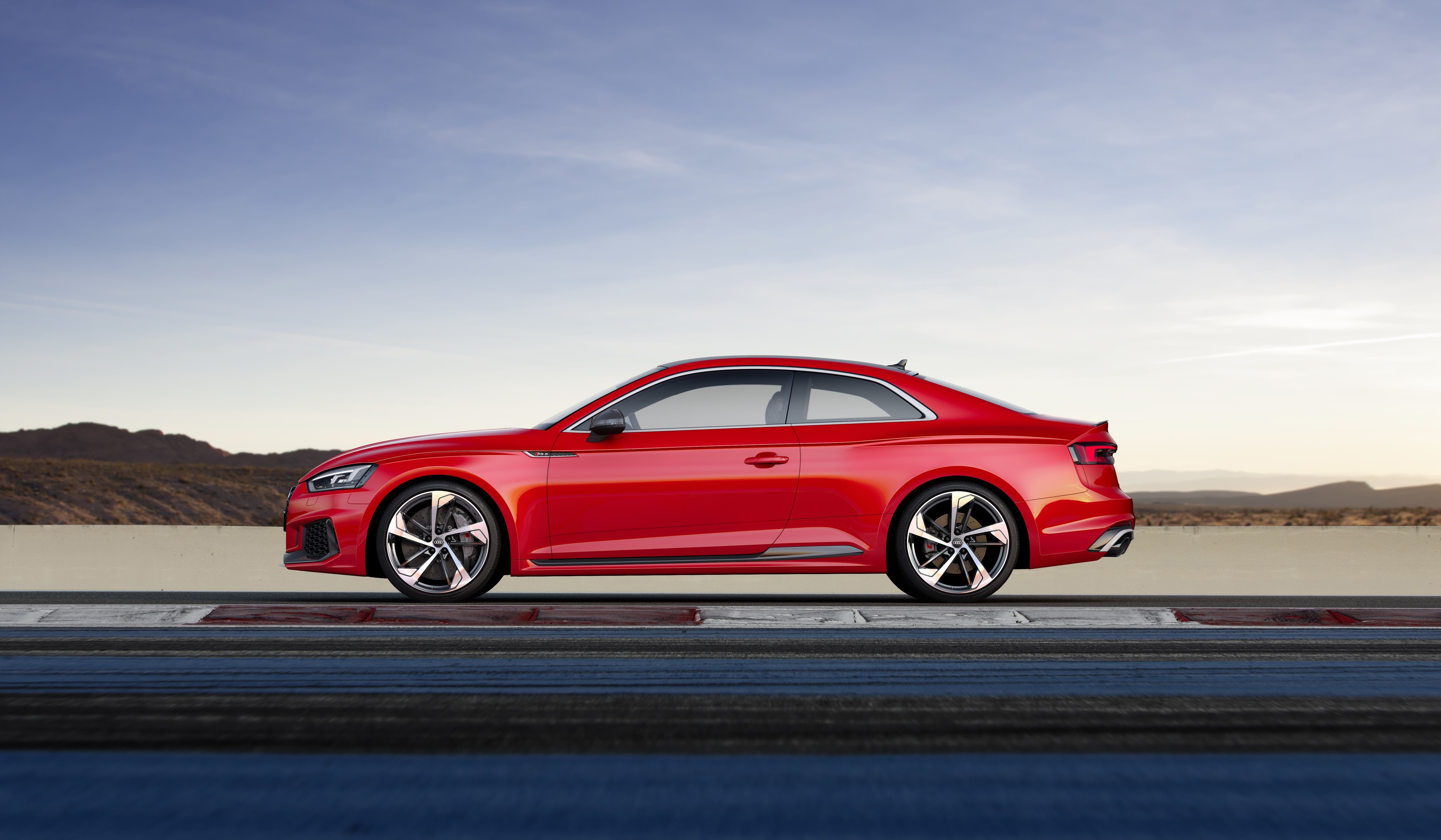 Red Audi RS5 Coupe on a Track HD Wallpaper