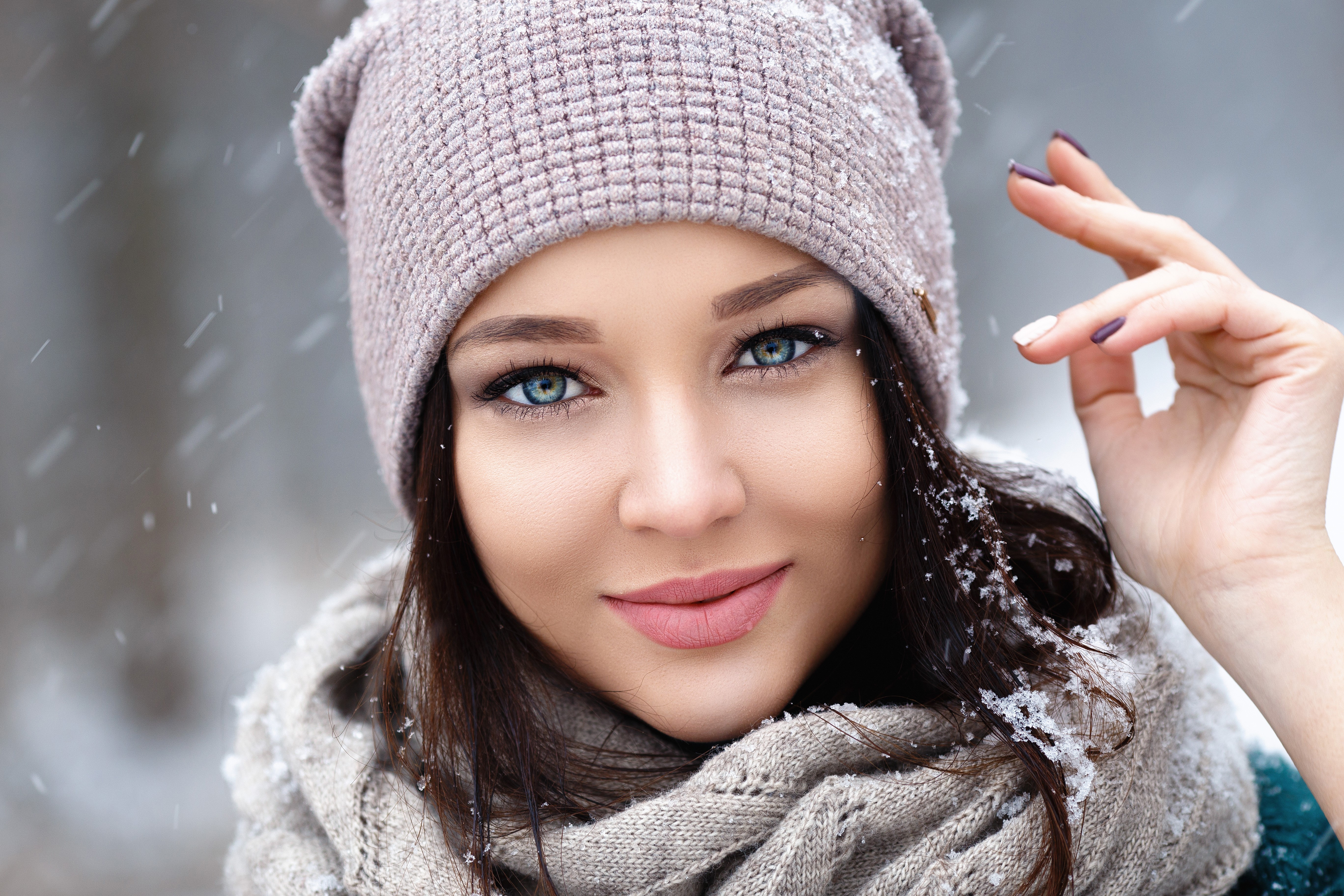 Woman in winter hat and scarf with snow HD Wallpaper
