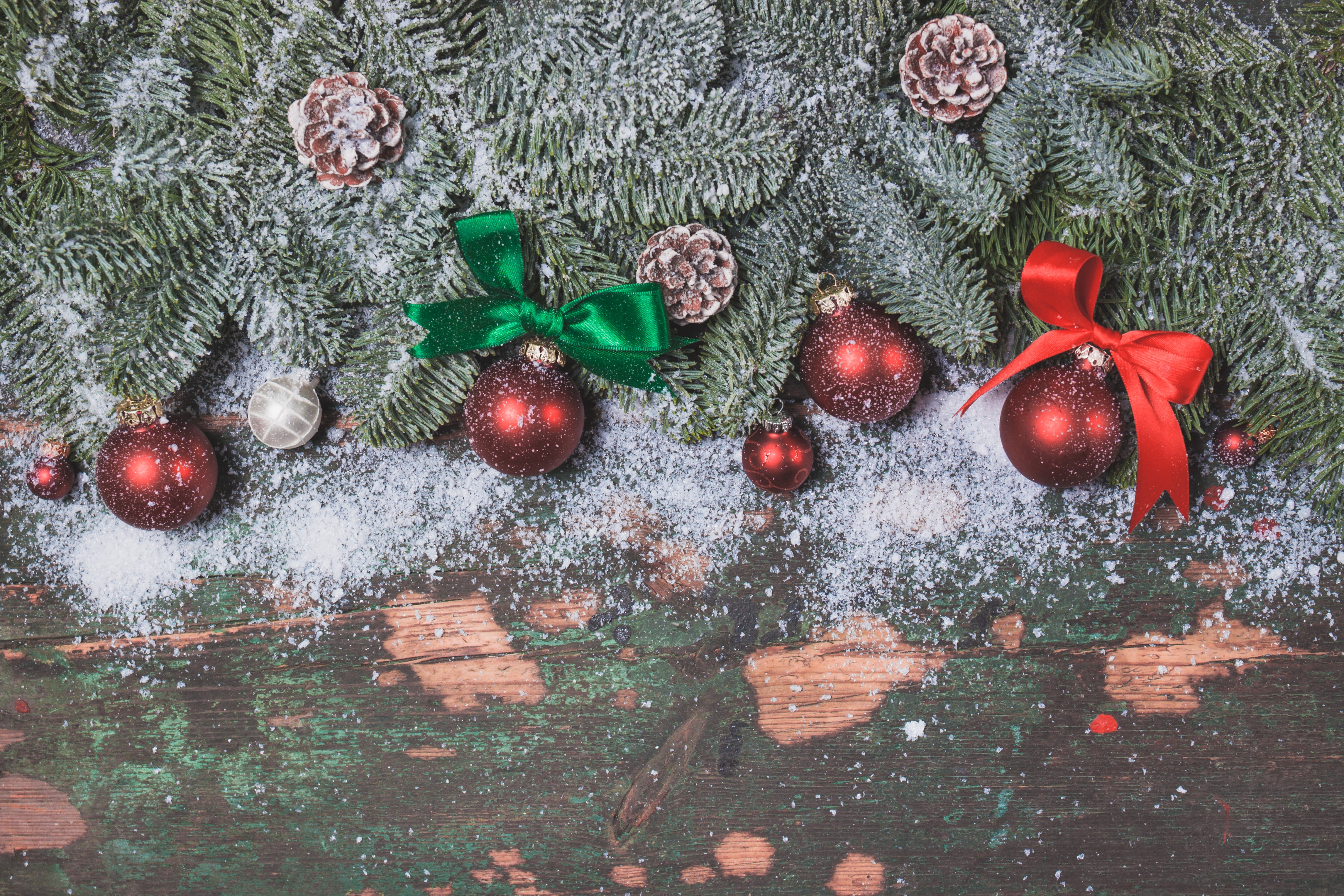 Christmas branches with ornaments and pine cones HD Wallpaper