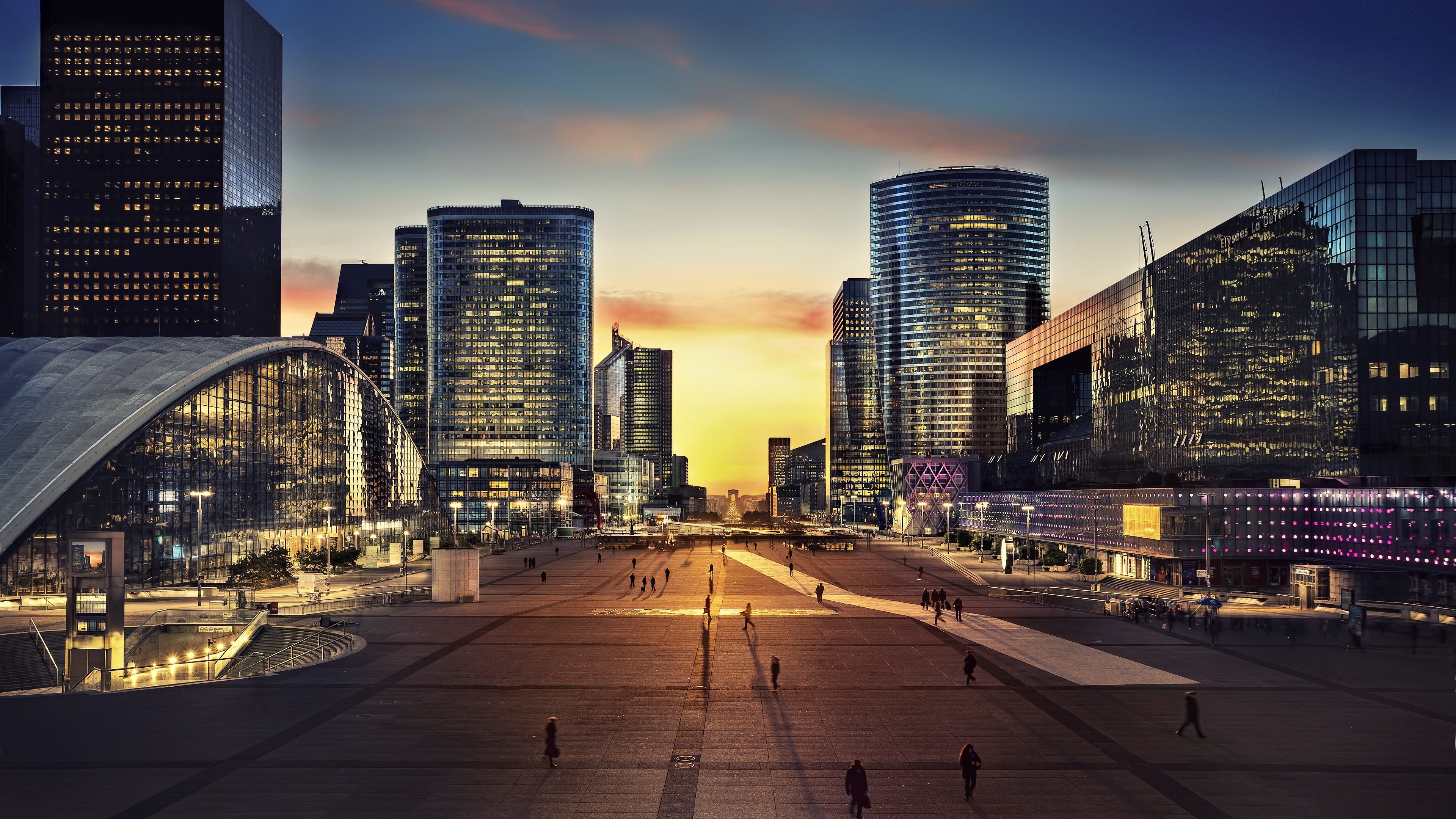 Modern Cityscape at Dusk with Arc de Triomphe HD Wallpaper