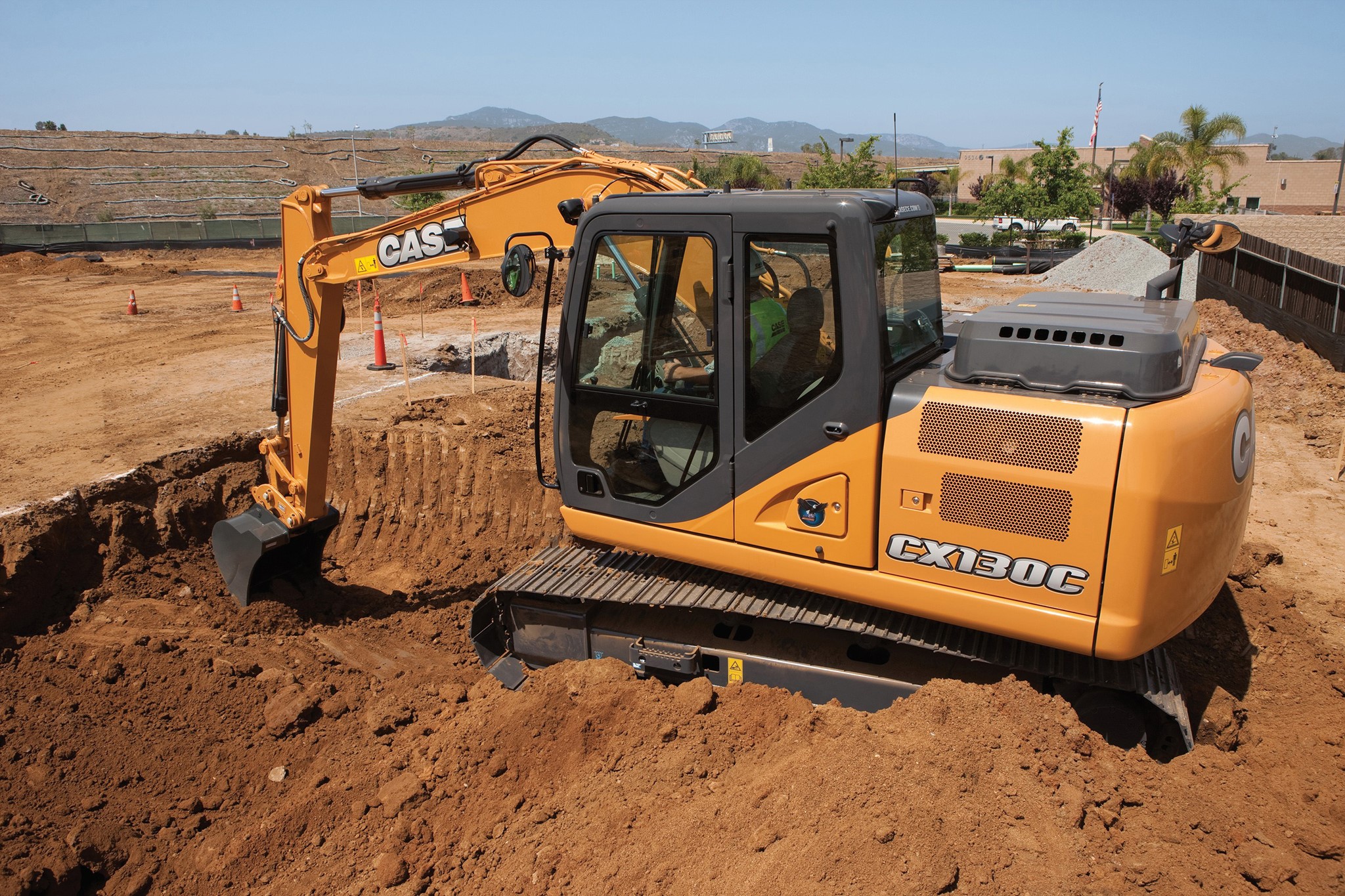 Case CX130C Excavator digging a trench HD Wallpaper
