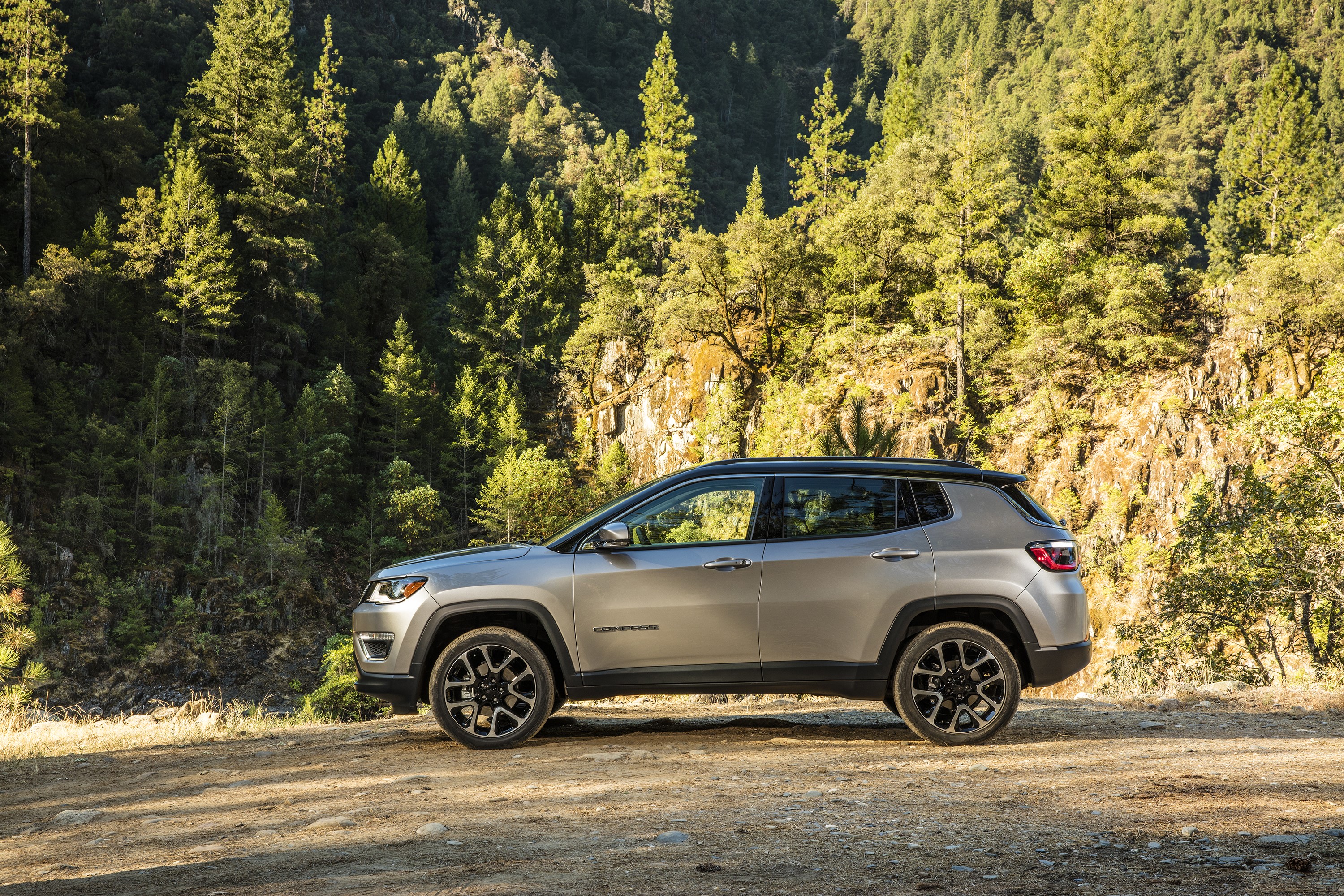 Silver Jeep Compass Trailhawk parked on dirt road HD Wallpaper