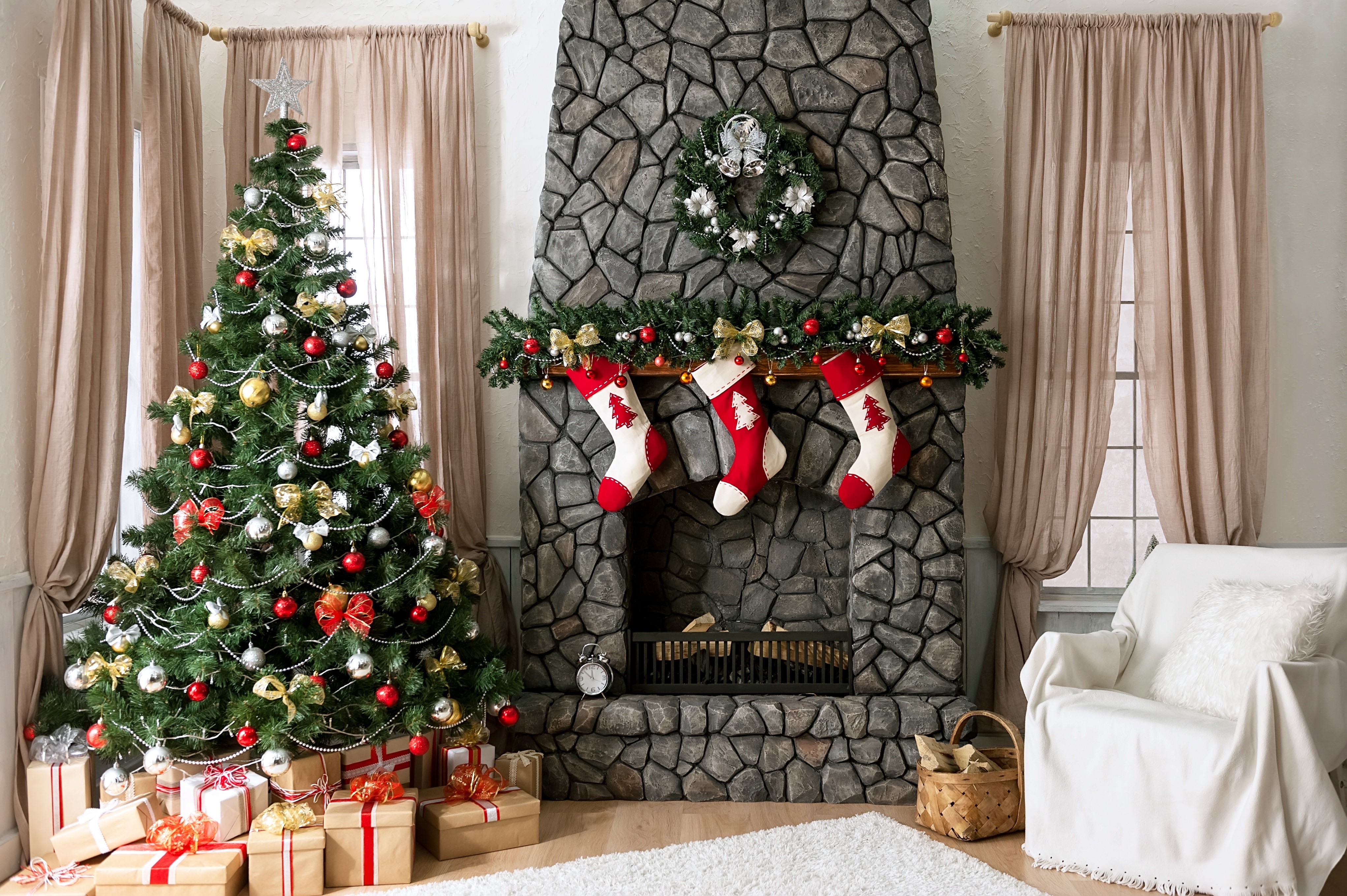 Christmas tree and fireplace with gifts and stockings HD Wallpaper