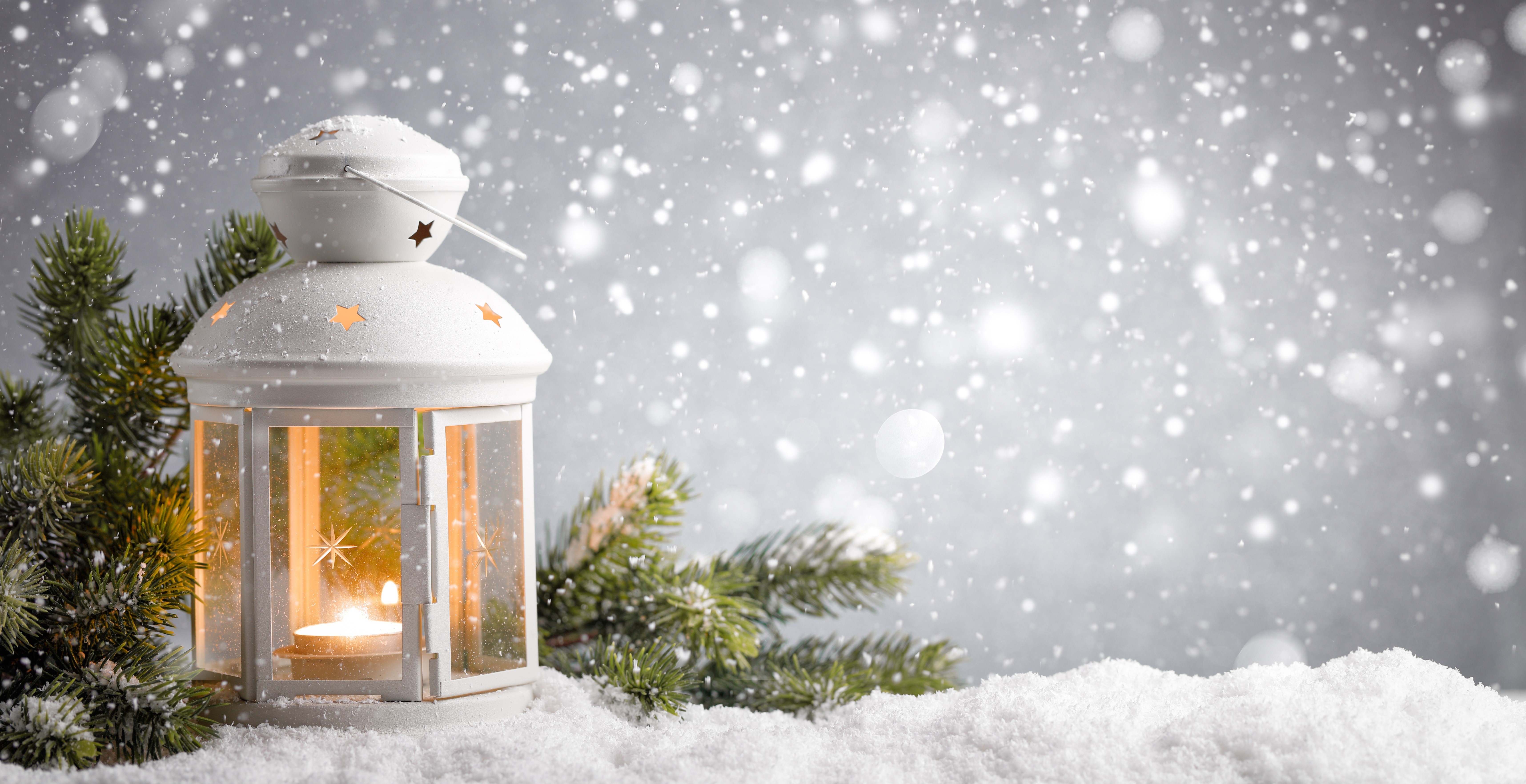 White lantern with candle in snow HD Wallpaper