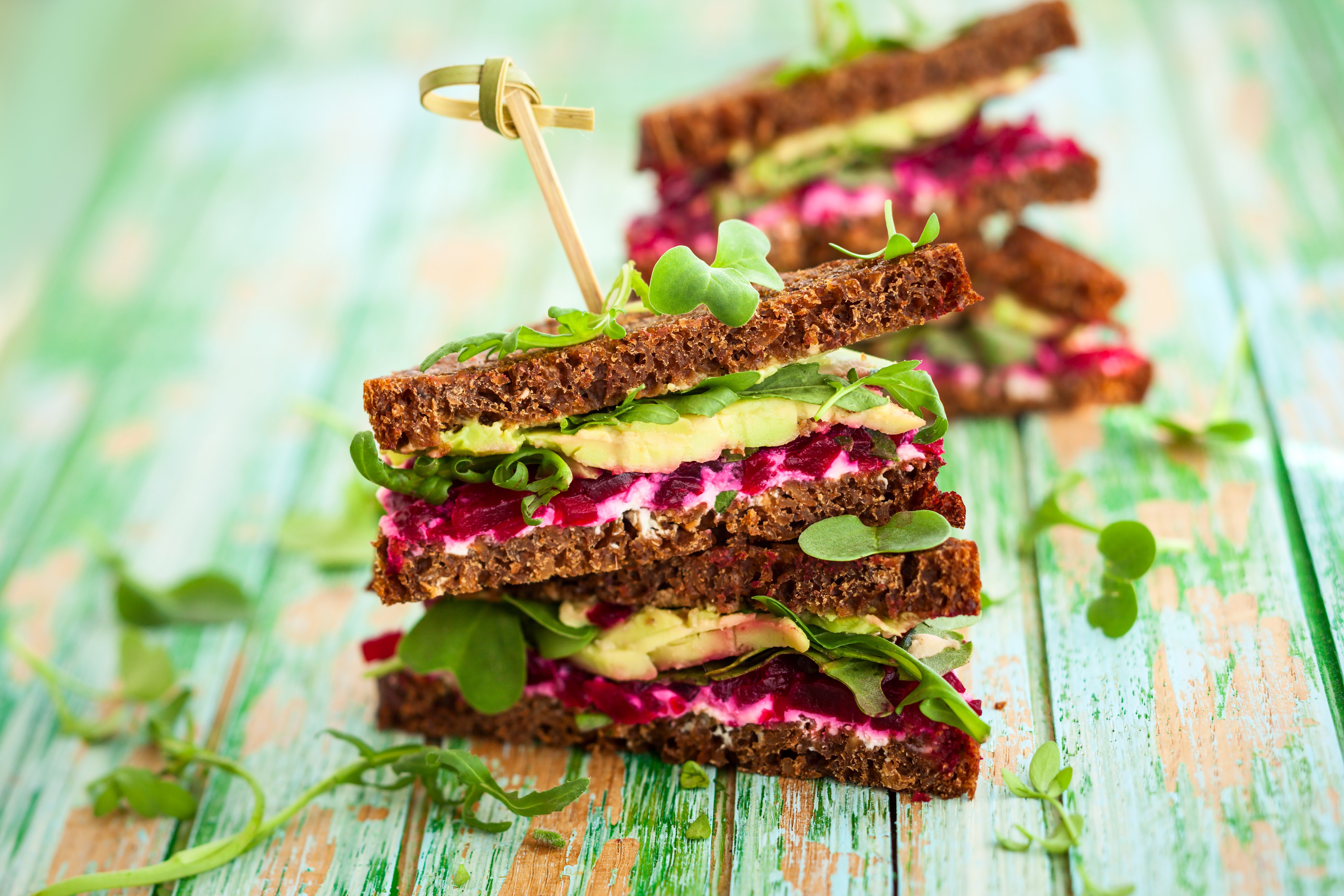 Stack of Beetroot and Avocado Sandwiches on Rustic Wood HD Wallpaper
