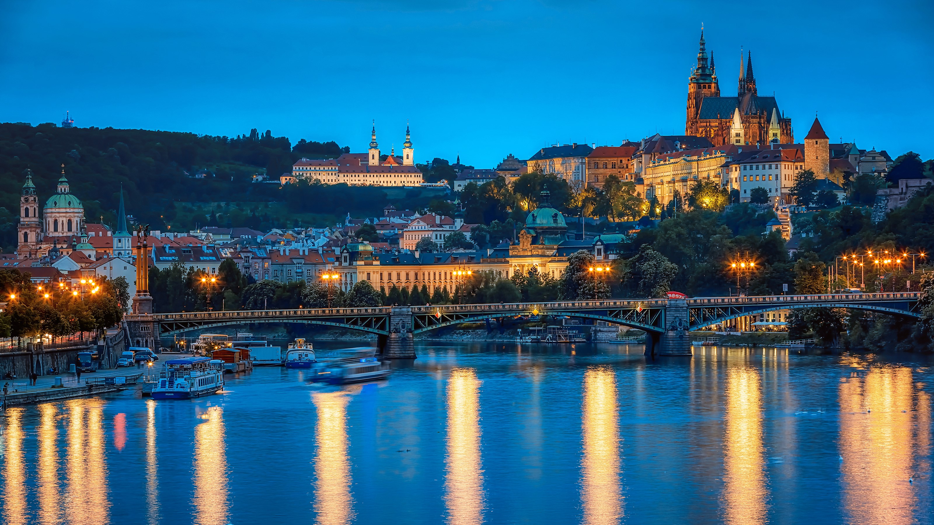 Prague skyline with Vltava River and bridges at dusk HD Wallpaper