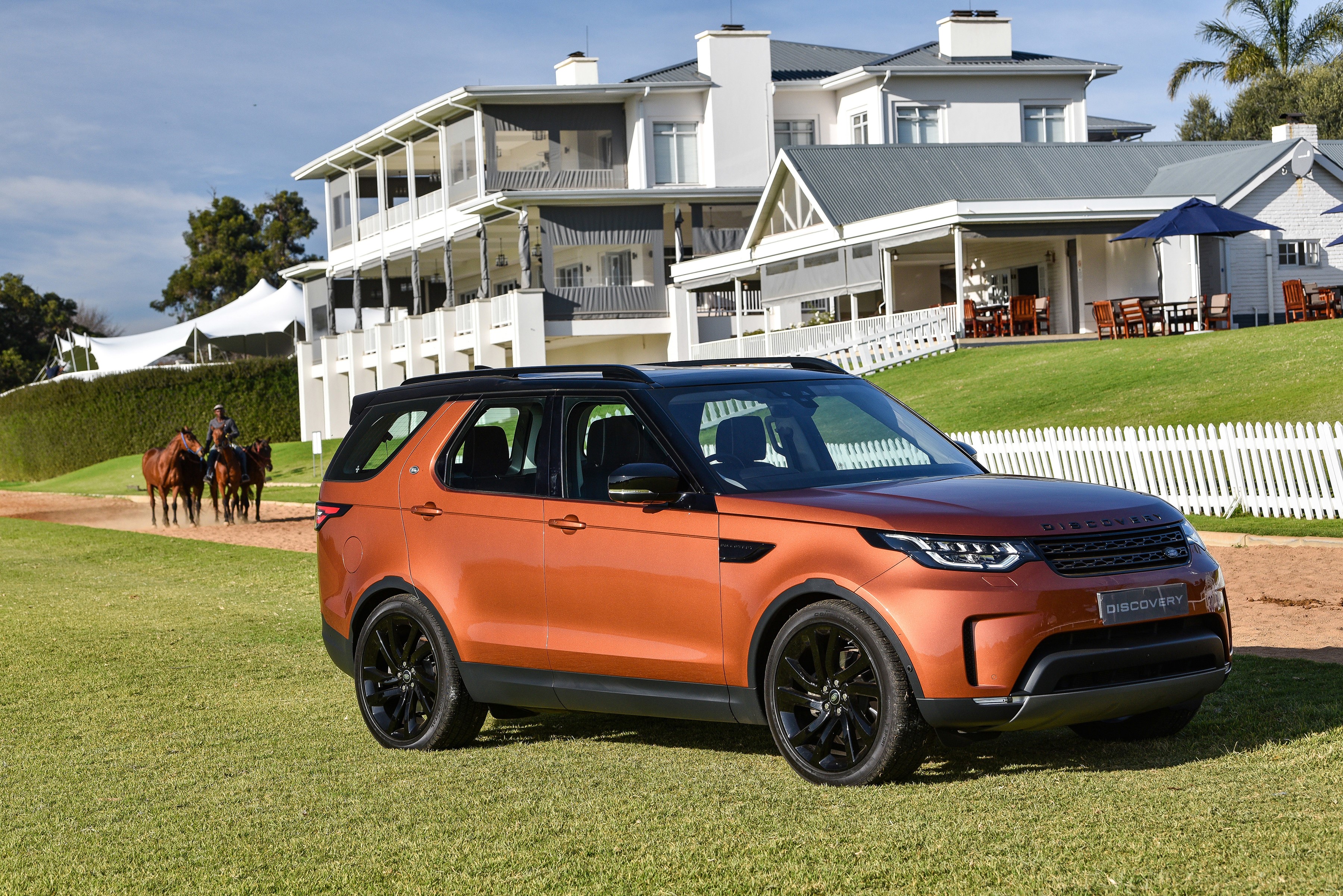 Orange Land Rover Discovery First Edition SUV HD Wallpaper