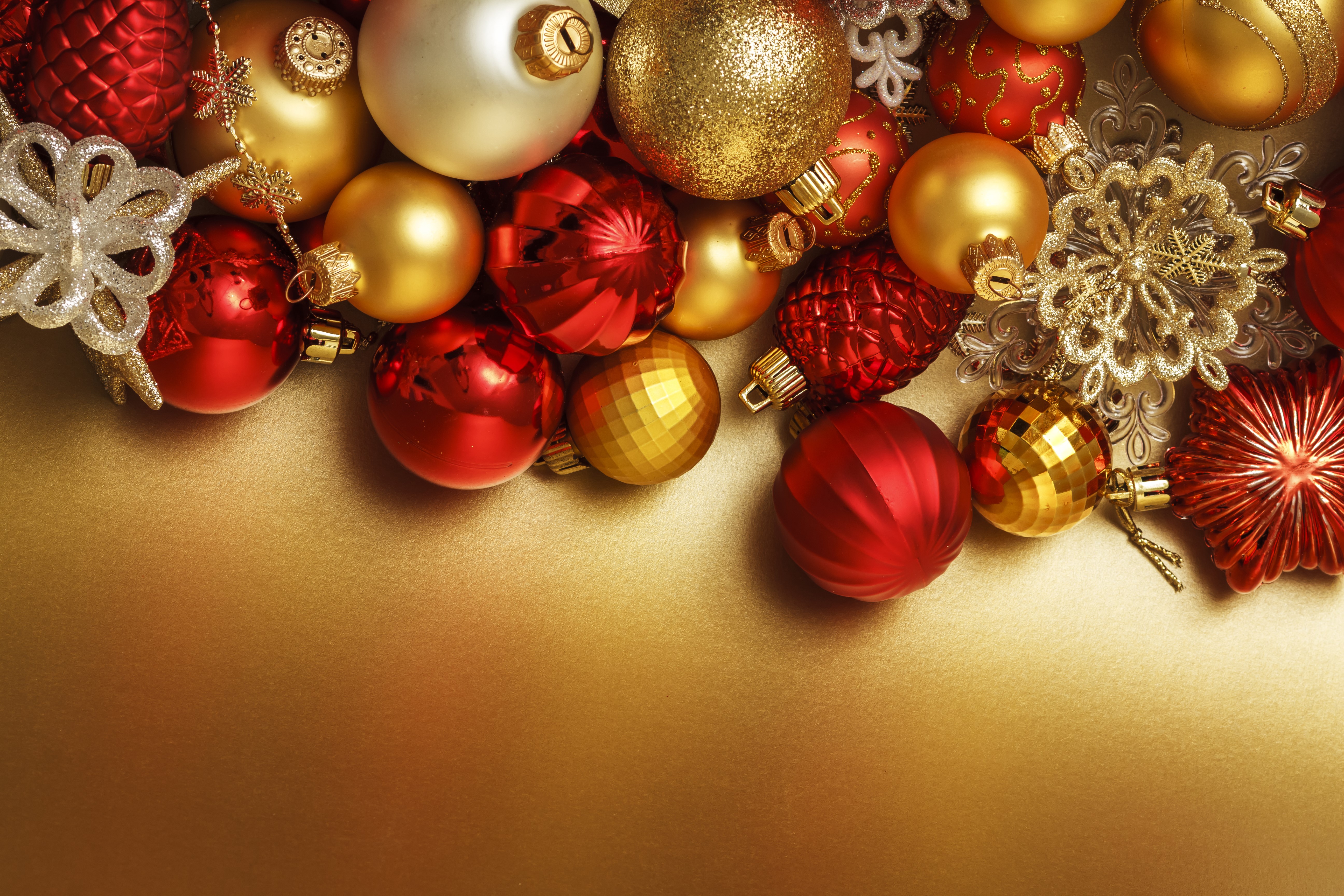 Christmas ornaments and snowflakes on a gold background HD Wallpaper