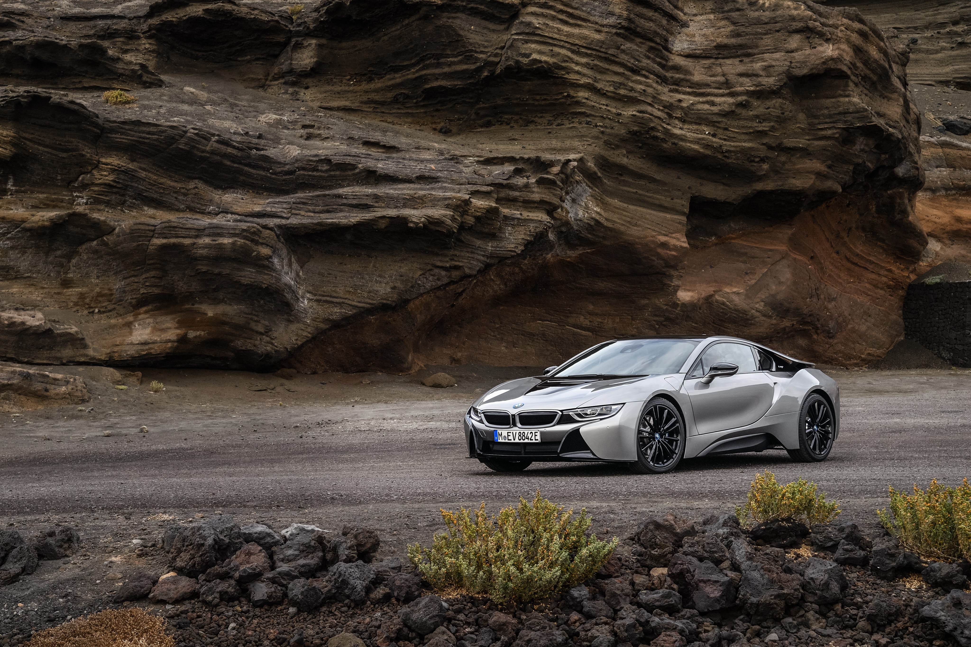Grey Metallic BMW i8 Coupe on Rocky Terrain HD Wallpaper