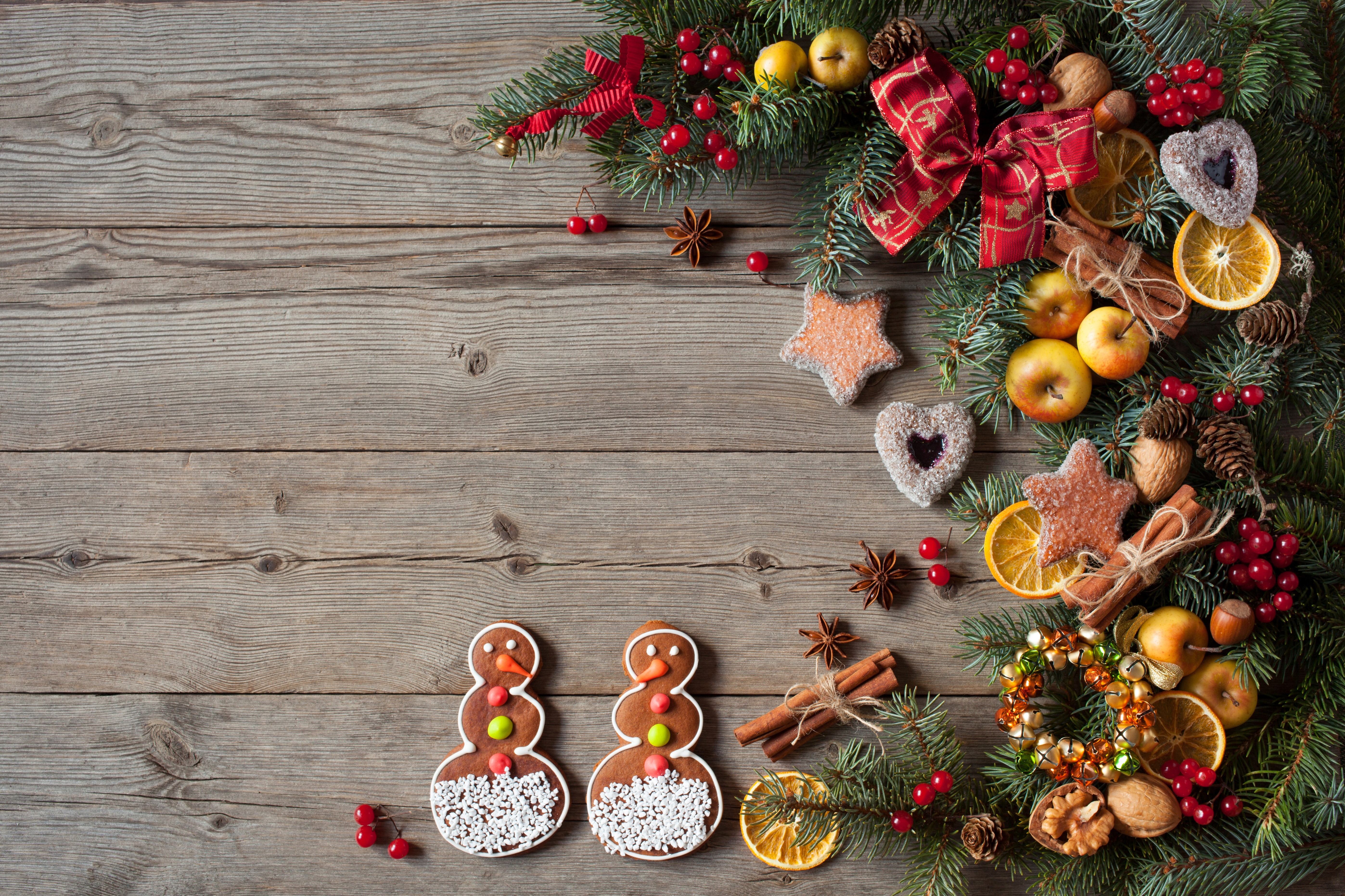 Christmas decorations with cookies and apples on wood HD Wallpaper