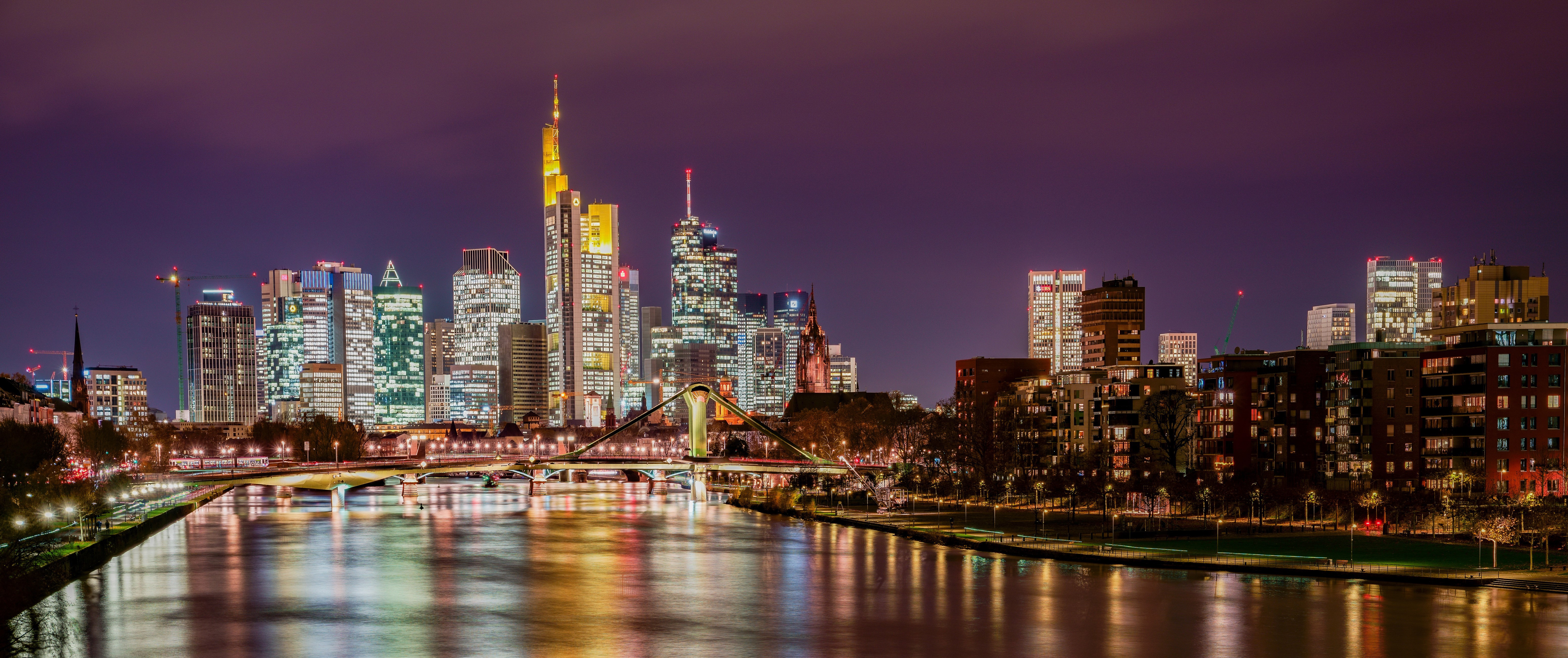 Frankfurt skyline with river and bridge at night HD Wallpaper